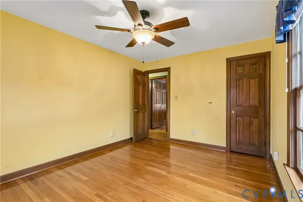 a view of a lake with couches and trees