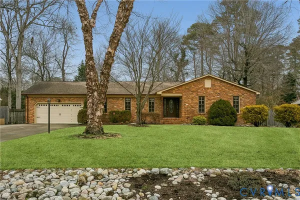 a bathroom with a tub and shower