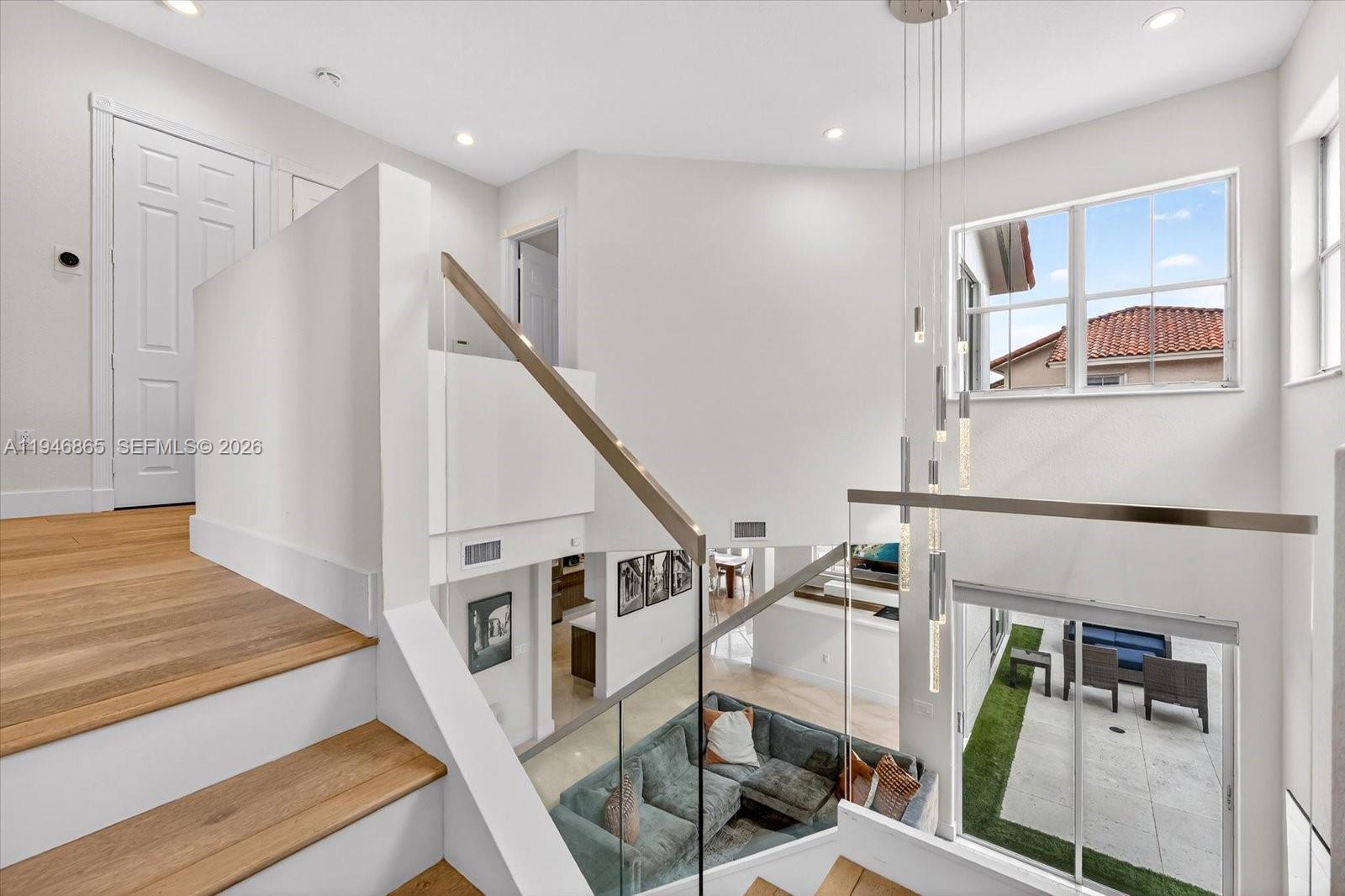 1469 Shoreline Way Hollywood, FL 33019 - Photo 17 of 46 a view of entryway and hall with wooden floor