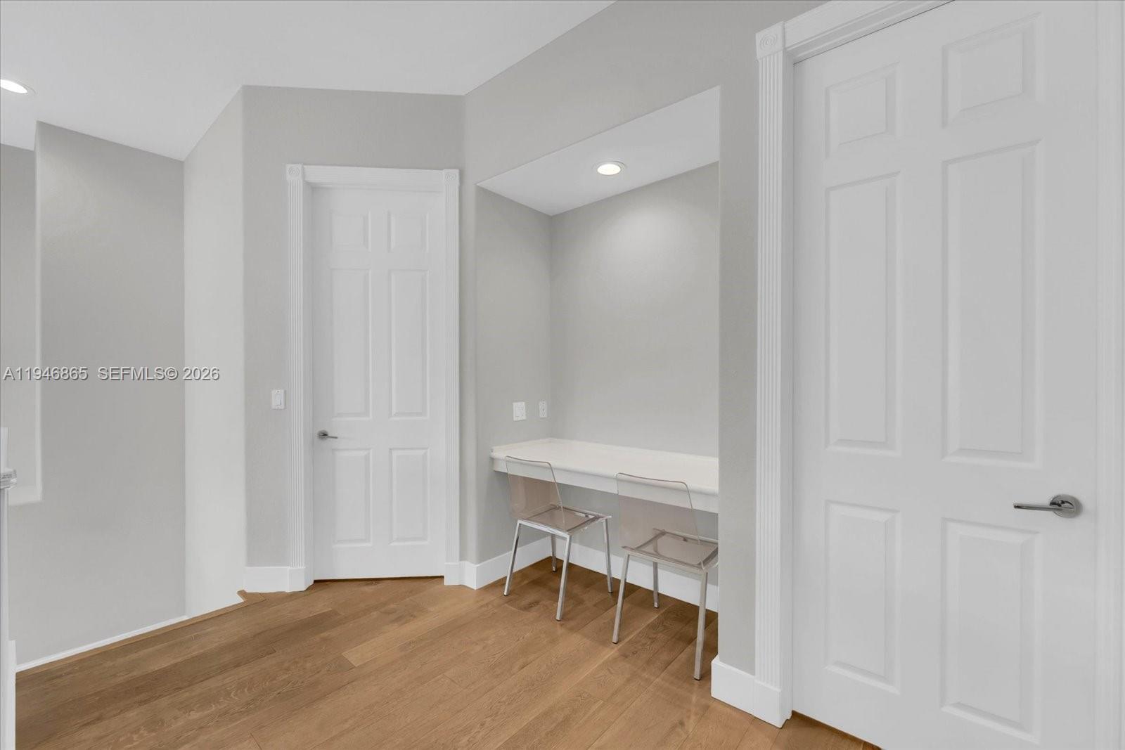 1469 Shoreline Way Hollywood, FL 33019 - Photo 28 of 46 a view of a room with a wooden table and chair