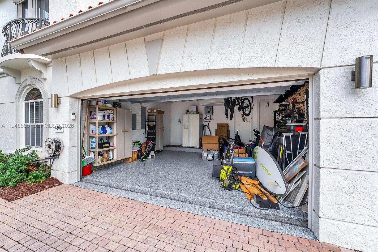 1469 Shoreline Way Hollywood, FL 33019 - Photo 34 of 46 a view of a garage with storage