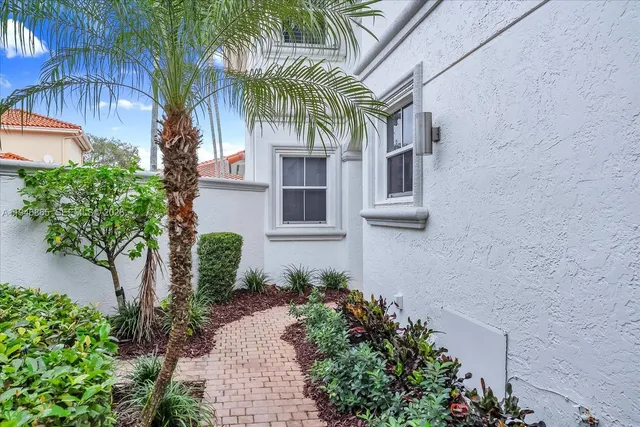 a view of a house with a street