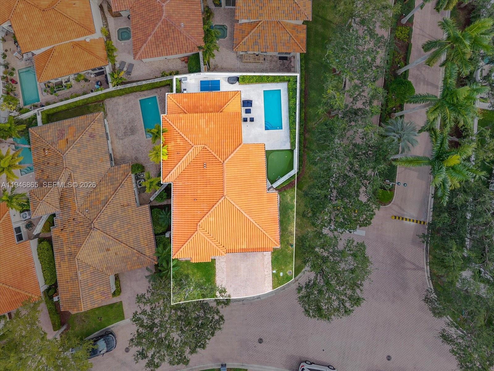 1469 Shoreline Way Hollywood, FL 33019 - Photo 37 of 46 an aerial view of a house with a yard and sitting area