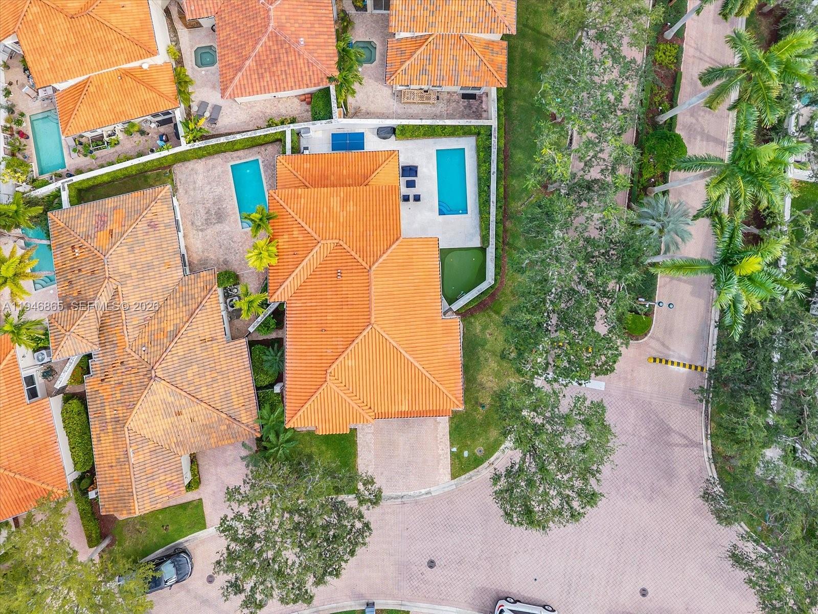 1469 Shoreline Way Hollywood, FL 33019 - Photo 38 of 46 an aerial view of a house with a yard and sitting area