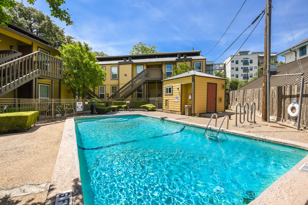 1000 West 26th Street, Unit 114 Austin, TX 78705 - Photo 12 of 20 a view of a house with a backyard