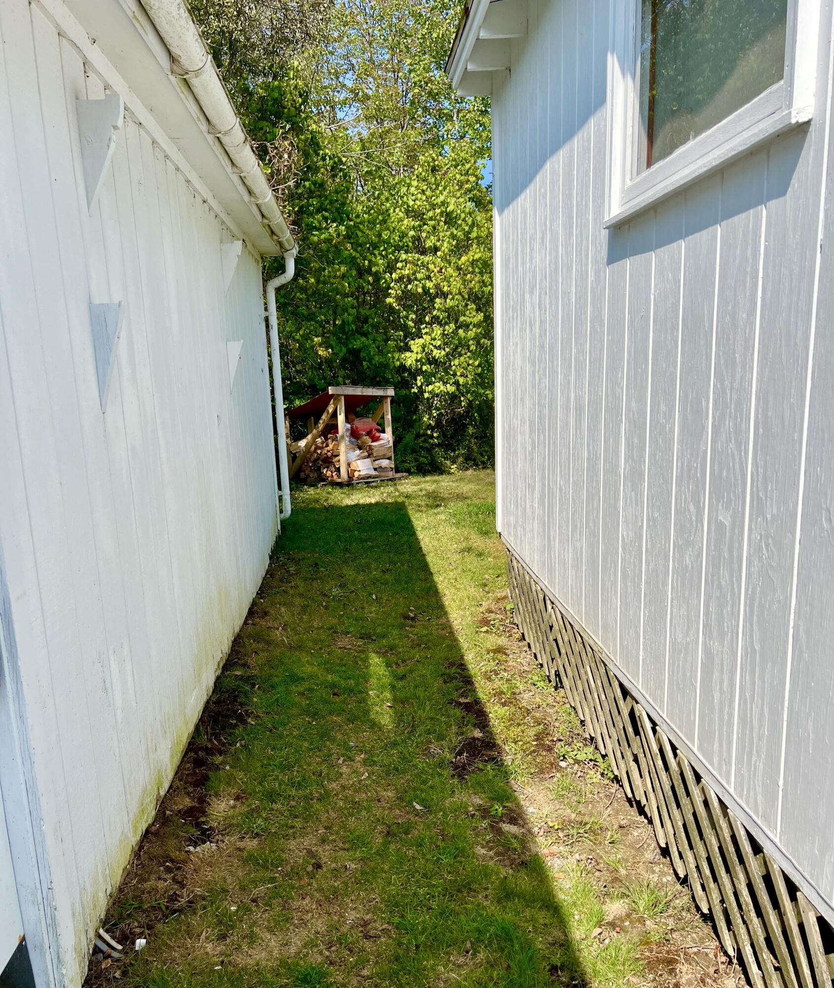 14 Seal Cove Road Southwest Harbor, ME 04679 - Photo 55 of 57 Between garage and home