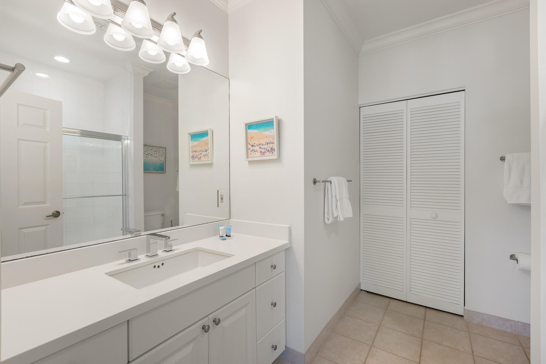 63 Sunset Key Drive Key West, FL 33040 - Photo 24 of 47 a bathroom with a sink a light fixture and a mirror