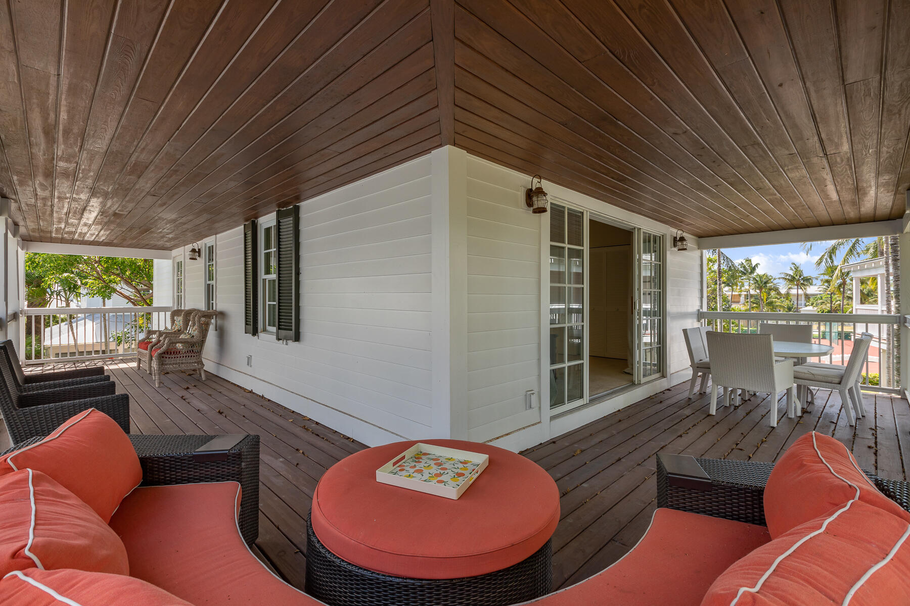 63 Sunset Key Drive Key West, FL 33040 - Photo 27 of 47 a living room with furniture and a large window