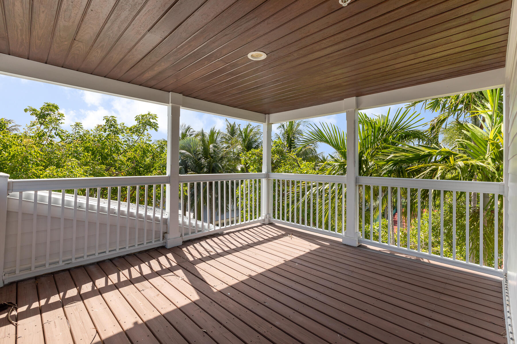 63 Sunset Key Drive Key West, FL 33040 - Photo 31 of 47 a view of deck with wooden floor