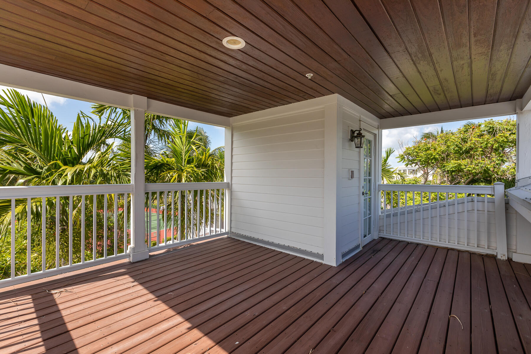 63 Sunset Key Drive Key West, FL 33040 - Photo 32 of 47 a view of a wooden deck