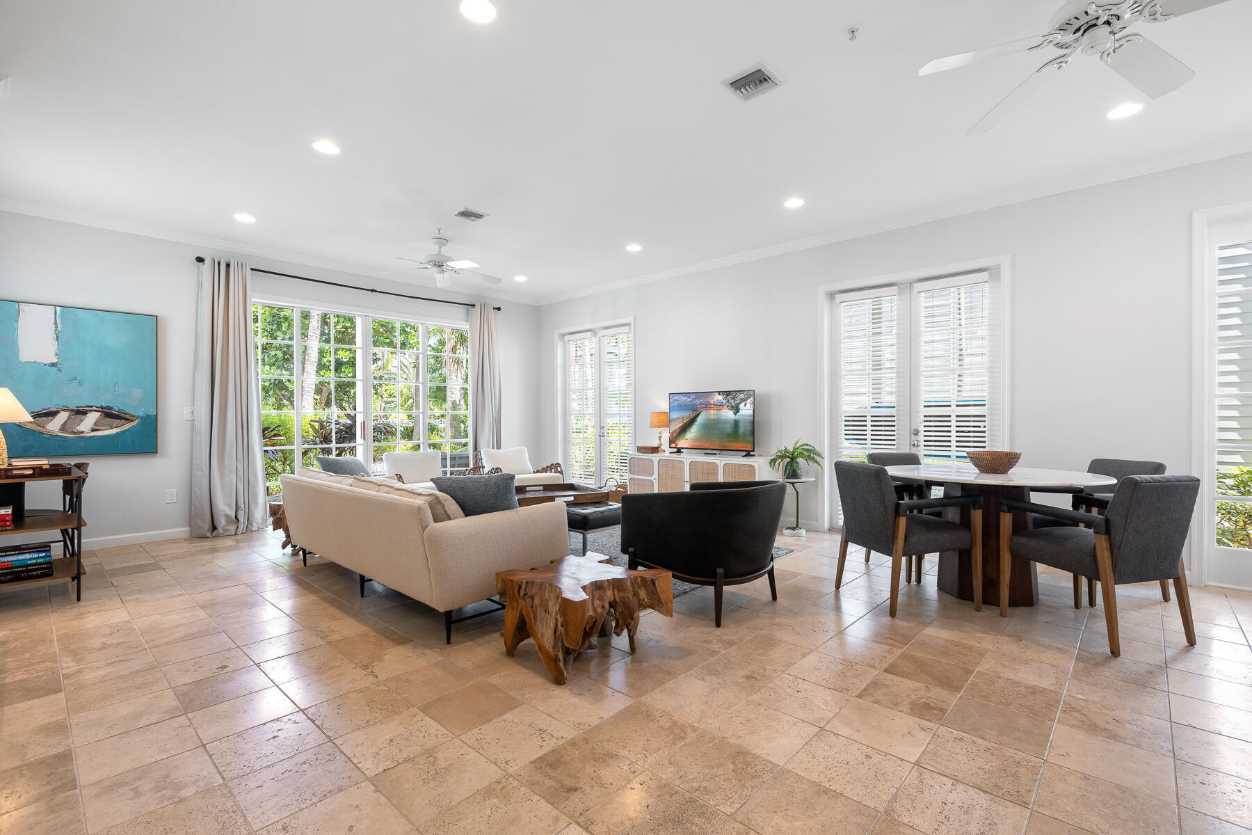 63 Sunset Key Drive Key West, FL 33040 - Photo 10 of 47 a living room with furniture and a large window