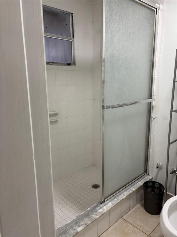 6005 West Clifton Street Tampa, FL 33634 - Photo 24 of 32 a bathroom with a shower