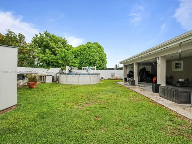 a view of a terrace with sitting area