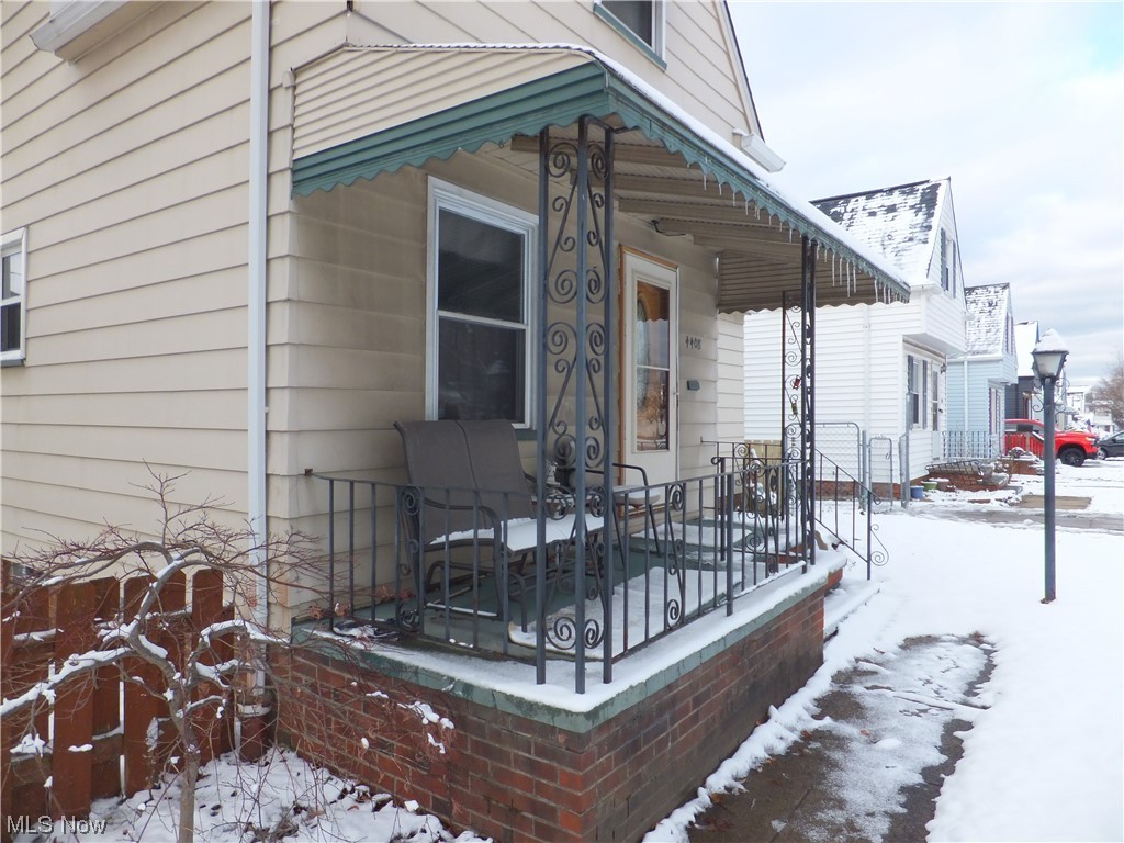 4408 Fulton Road Cleveland, OH 44144 - Photo 2 of 22 View of snow covered front porch