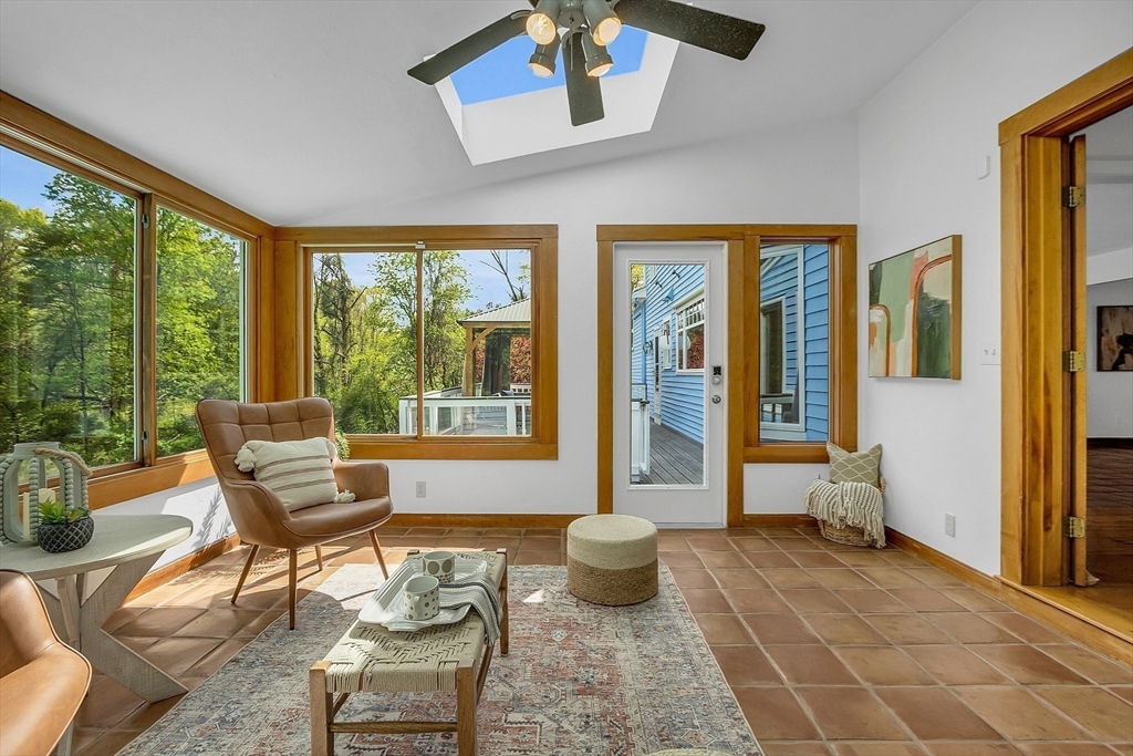 16 Bulette Road Acton, MA 01720 - Photo 20 of 42 a living room with furniture and a large window