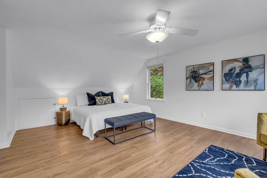 16 Bulette Road Acton, MA 01720 - Photo 22 of 42 a living room with furniture and a window