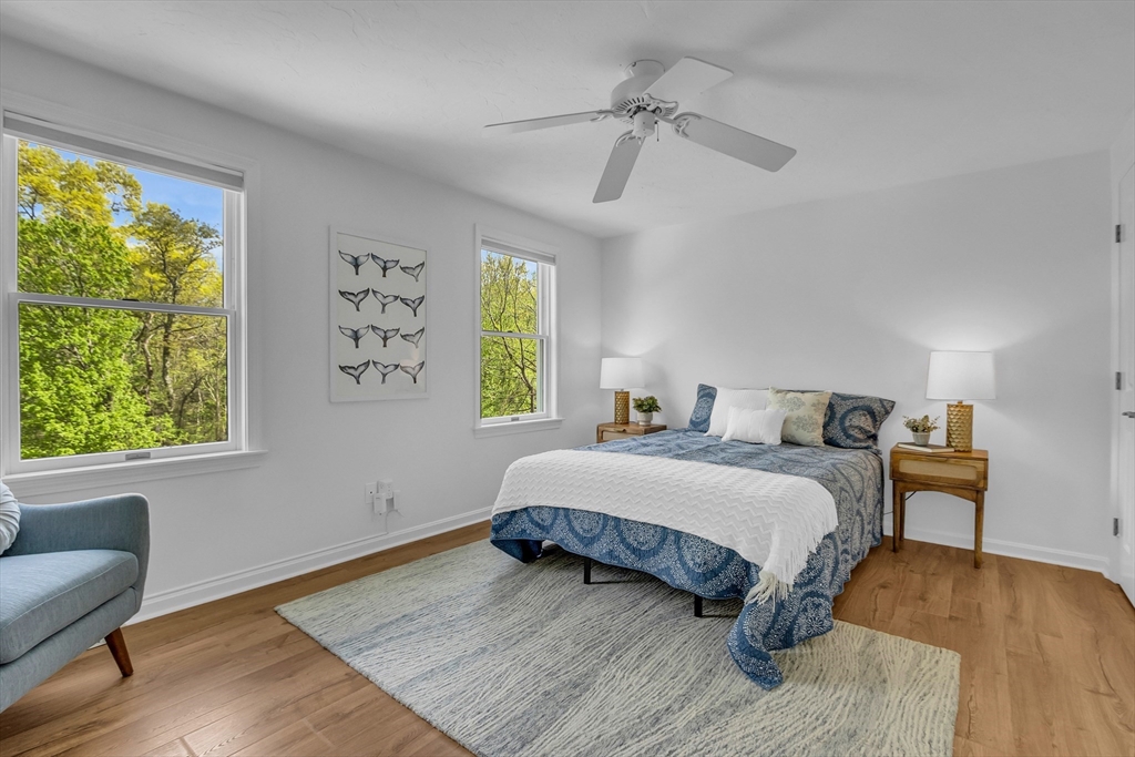 16 Bulette Road Acton, MA 01720 - Photo 25 of 42 a bedroom with a bed a lamps and a large window