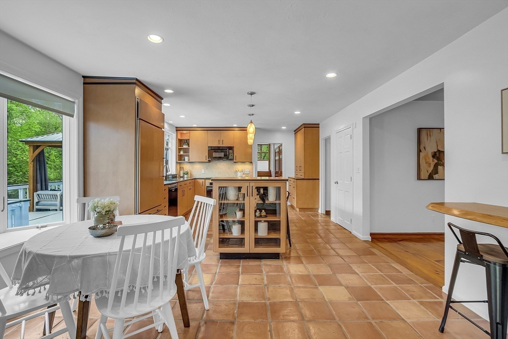 16 Bulette Road Acton, MA 01720 - Photo 6 of 42 a dining room with furniture and wooden floor