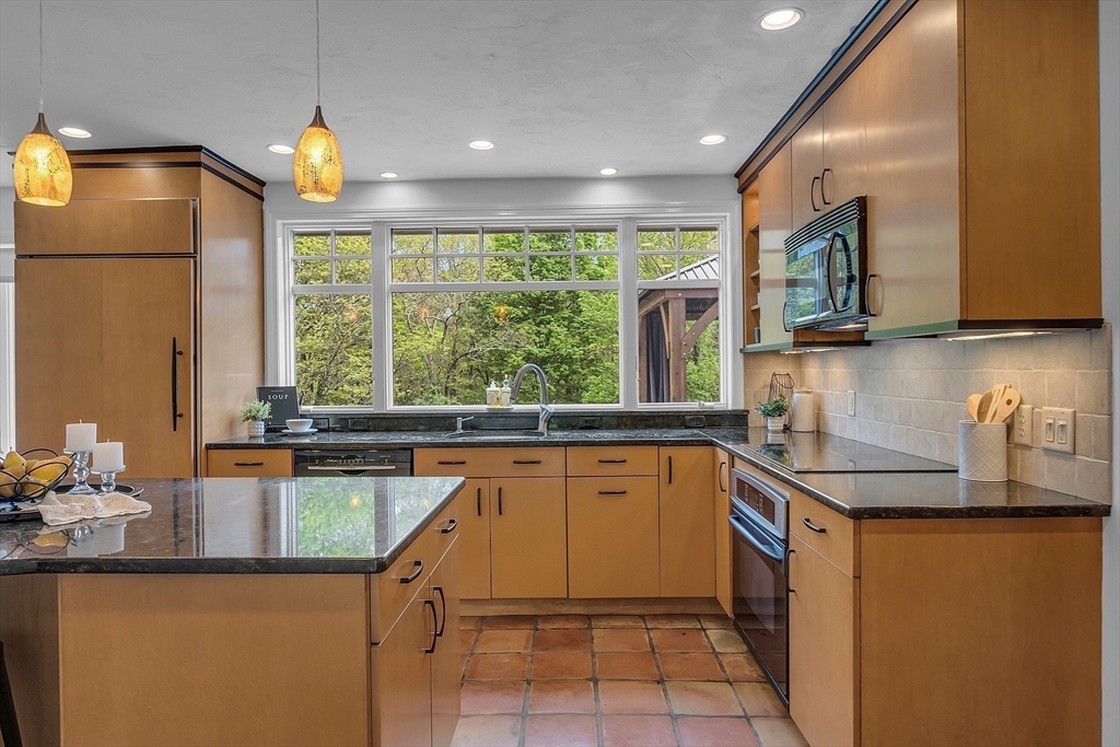 16 Bulette Road Acton, MA 01720 - Photo 9 of 42 a kitchen with a sink and large window
