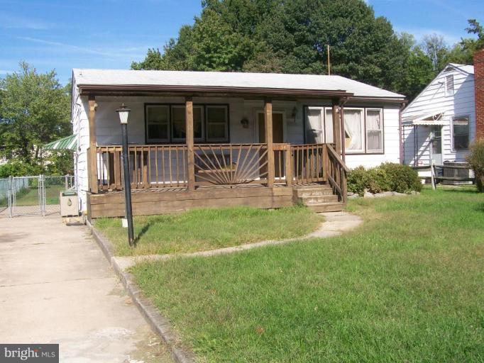 7734 North Point Road Sparrows Point, MD 21219 - Photo 1 of 1 a view of a house with backyard and porch