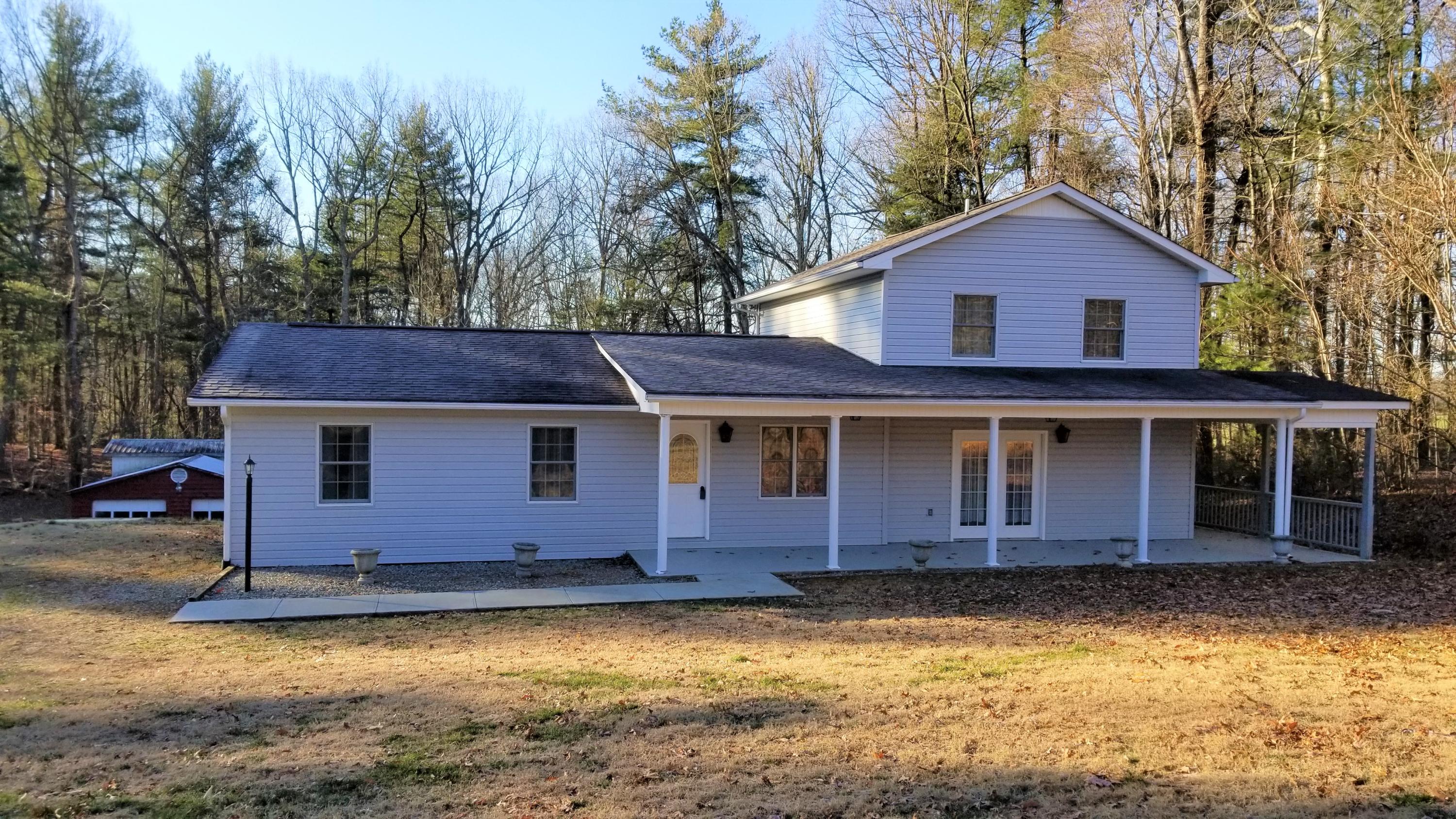 110 Foggy Ridge Road Rocky Mount, VA 24151 - Photo 1 of 35 a view of a house with a backyard