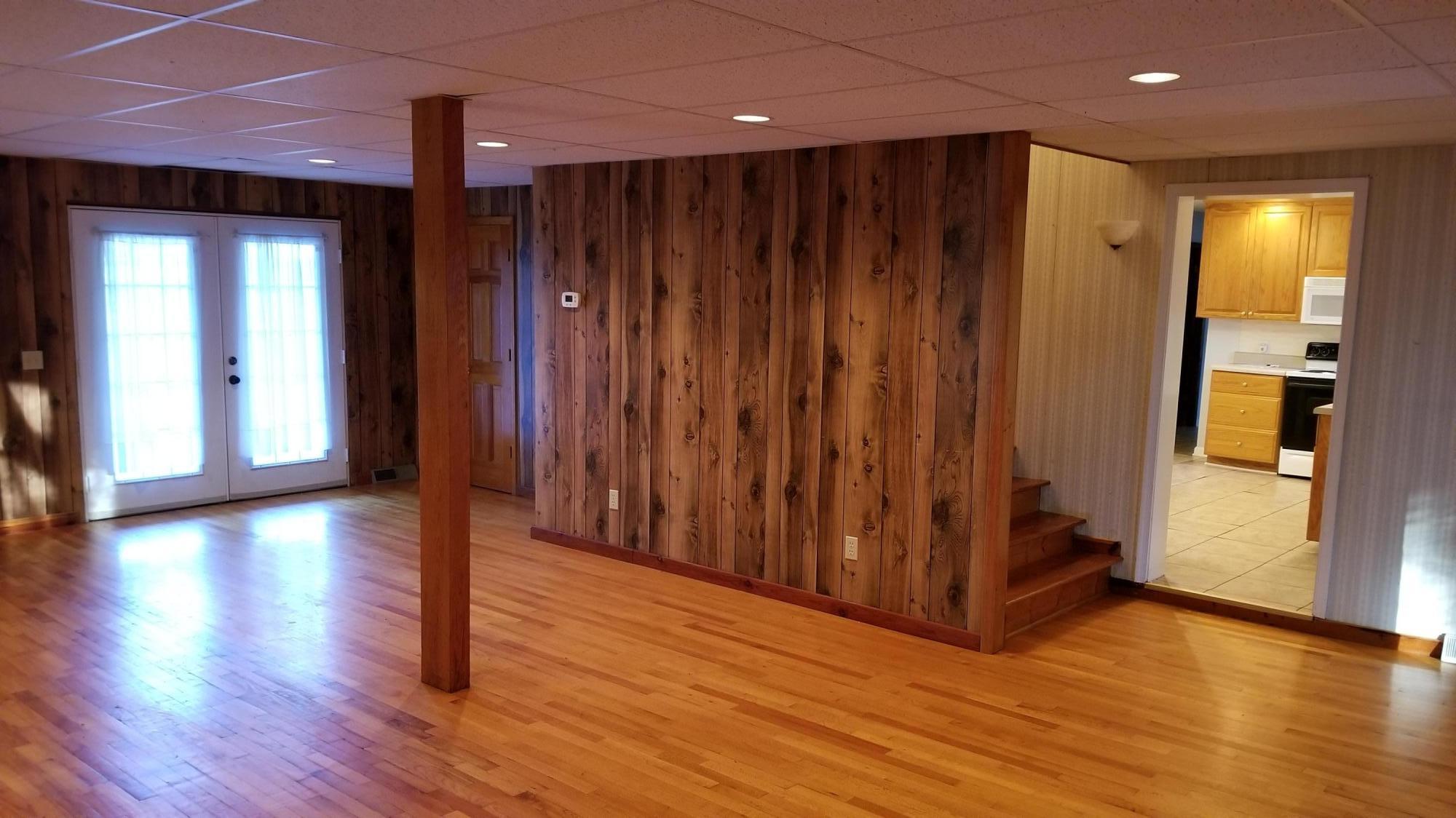 110 Foggy Ridge Road Rocky Mount, VA 24151 - Photo 12 of 35 a view of a hallway with wooden floor