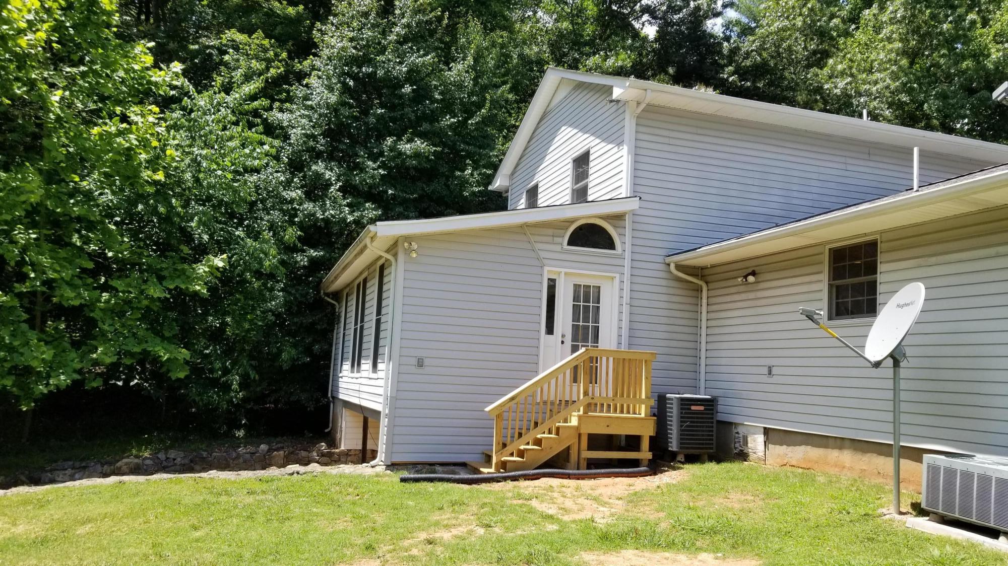 110 Foggy Ridge Road Rocky Mount, VA 24151 - Photo 25 of 35 a view of backyard with a garden