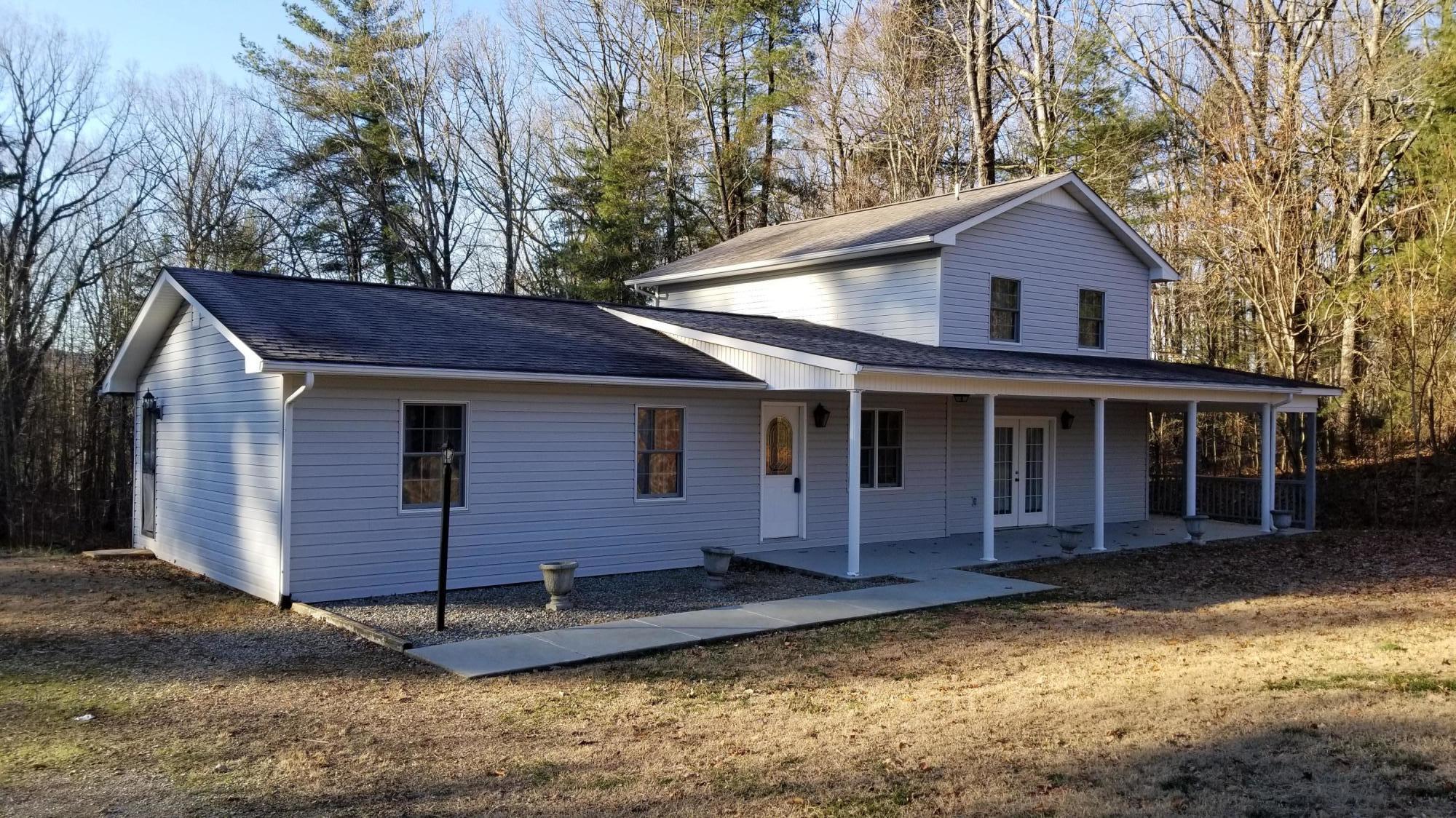 110 Foggy Ridge Road Rocky Mount, VA 24151 - Photo 35 of 35 a front view of a house with a yard