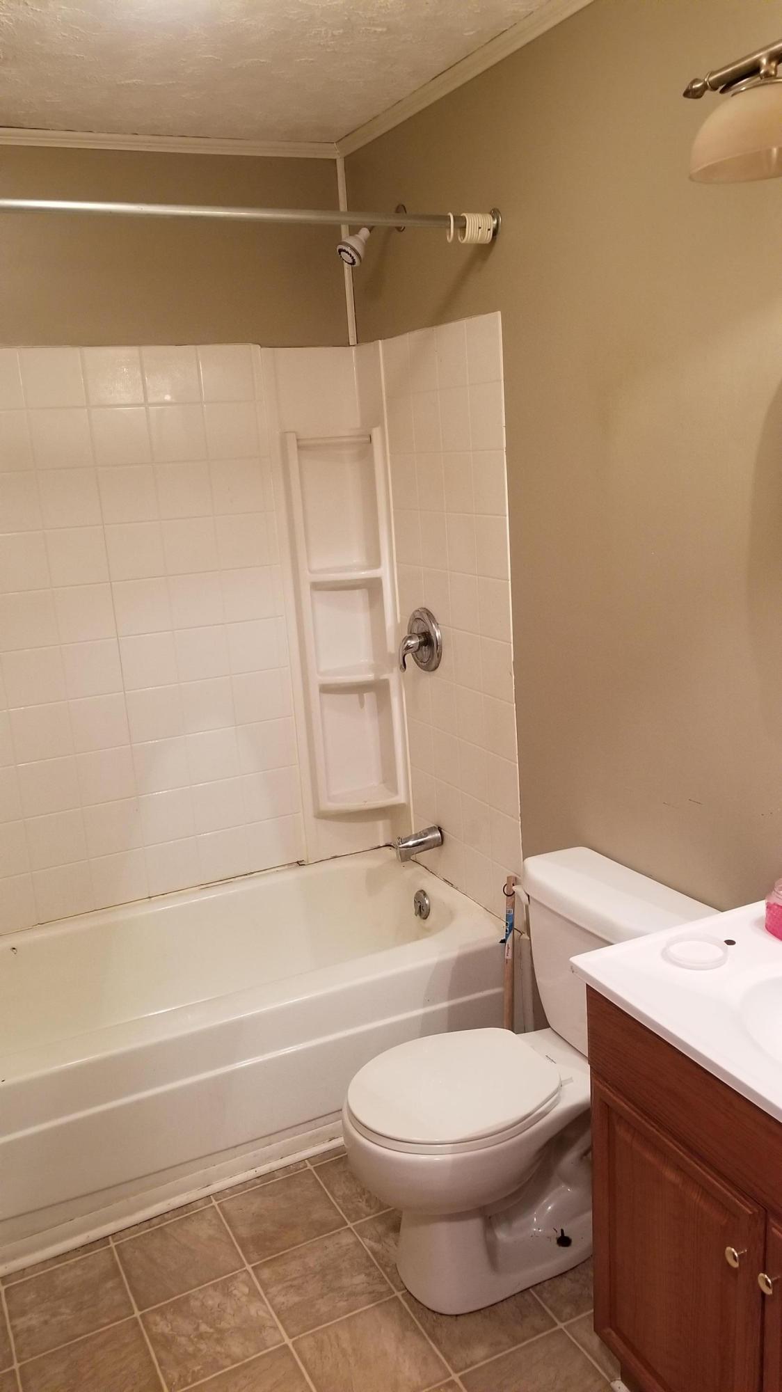 110 Foggy Ridge Road Rocky Mount, VA 24151 - Photo 8 of 35 a bathroom with a toilet and a shower
