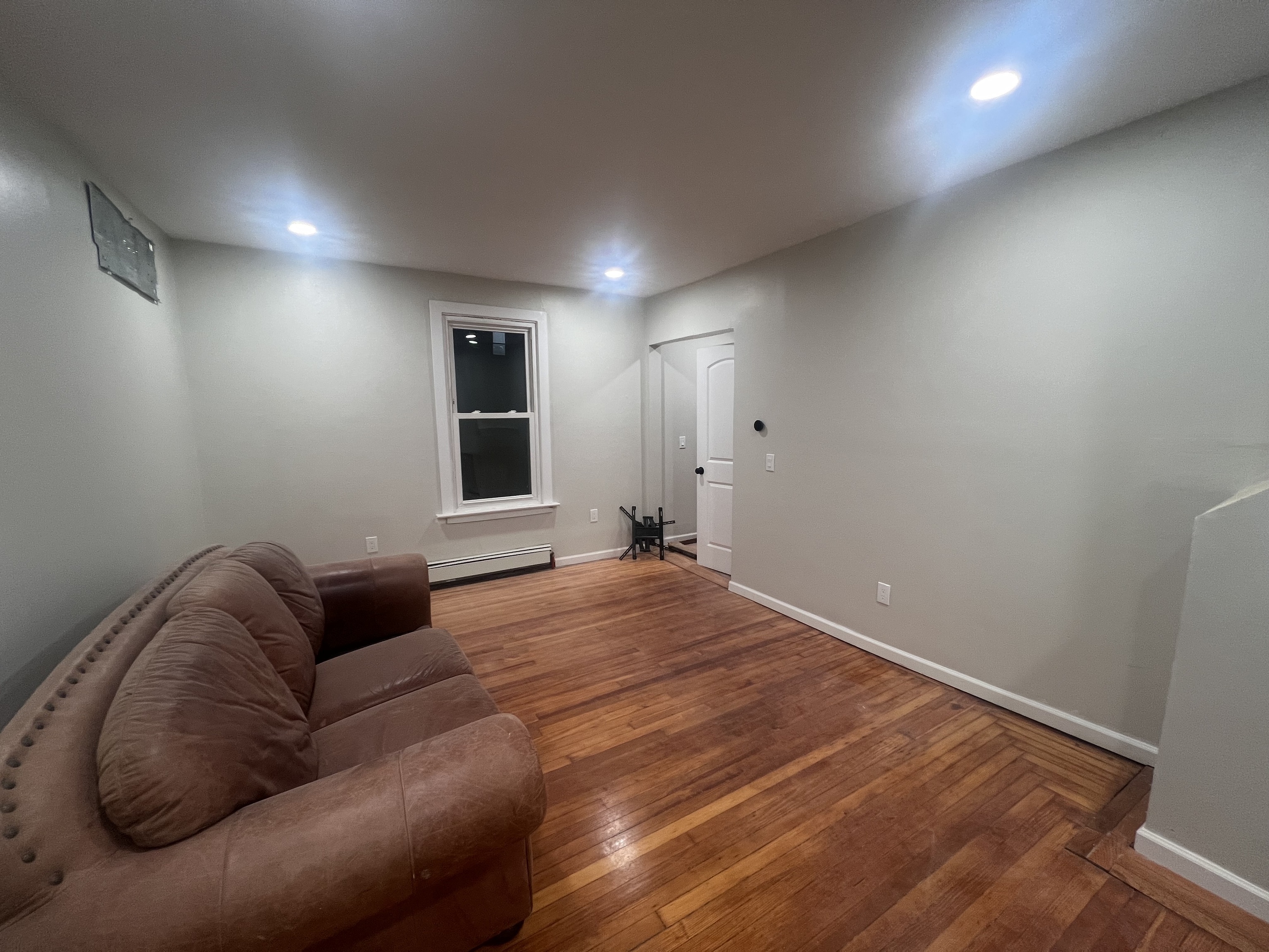121 Pond Lily Avenue New Haven, CT 06515 - Photo 13 of 22 a bedroom with a bed and a couch