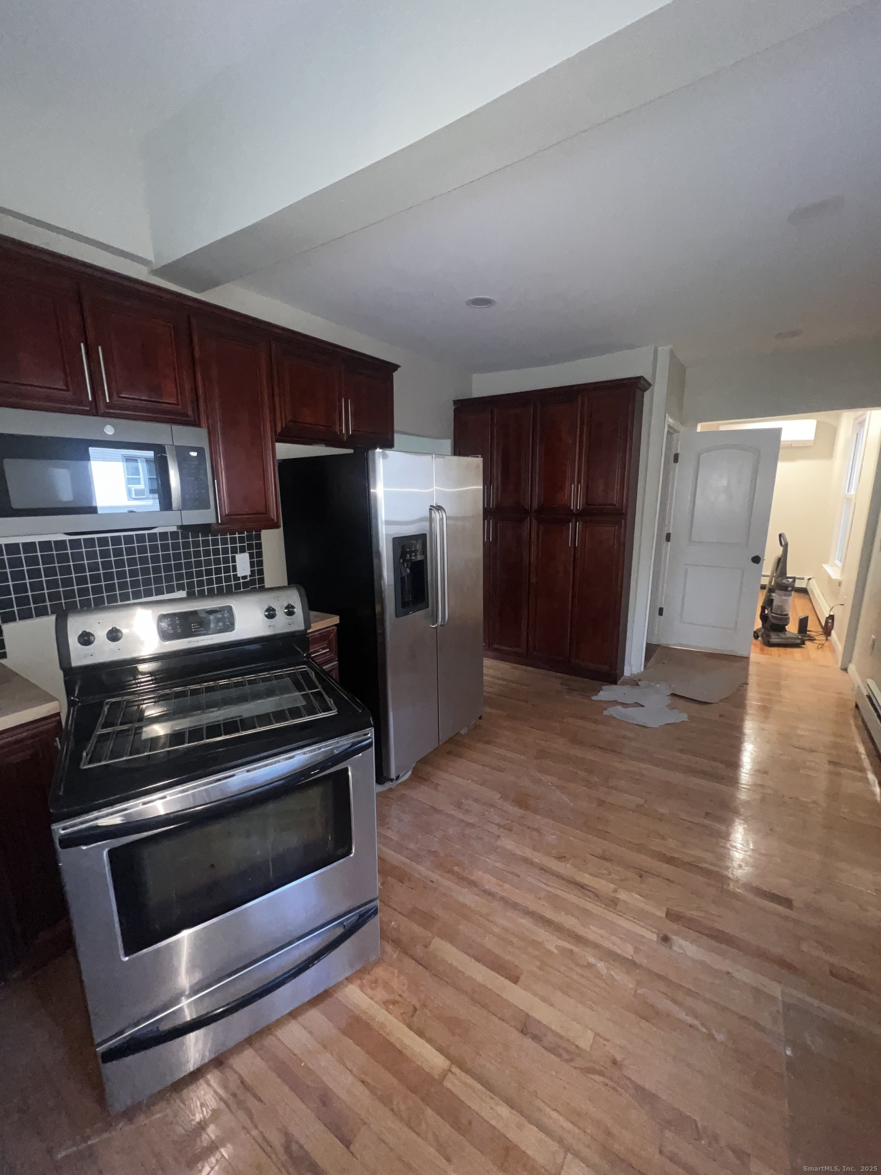 121 Pond Lily Avenue New Haven, CT 06515 - Photo 17 of 22 a kitchen with a stove and a refrigerator