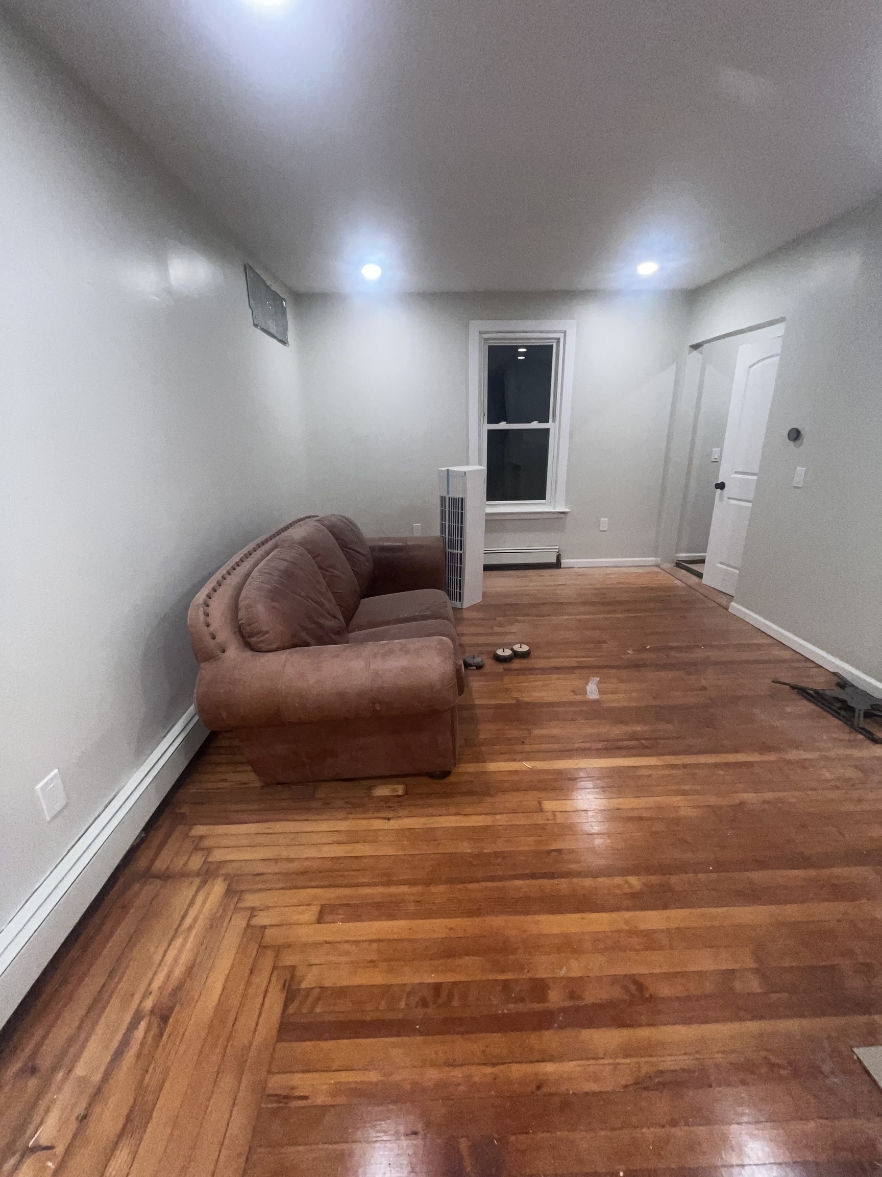 121 Pond Lily Avenue New Haven, CT 06515 - Photo 4 of 22 a living room with couch and a wooden floor