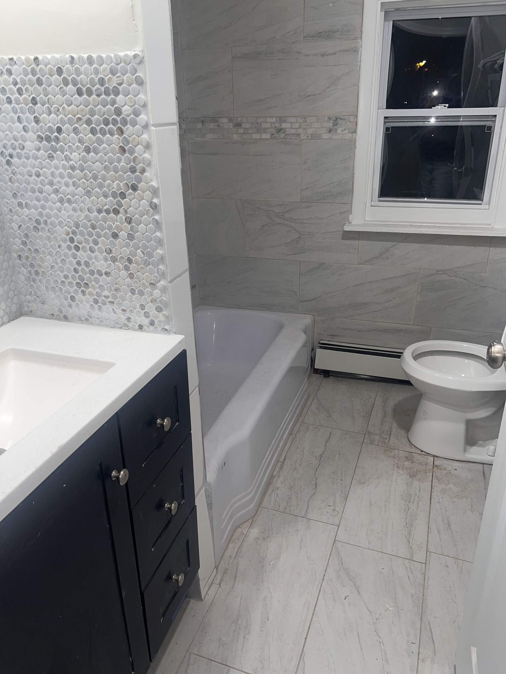 121 Pond Lily Avenue New Haven, CT 06515 - Photo 5 of 22 a bathroom with a sink a toilet and bathtub