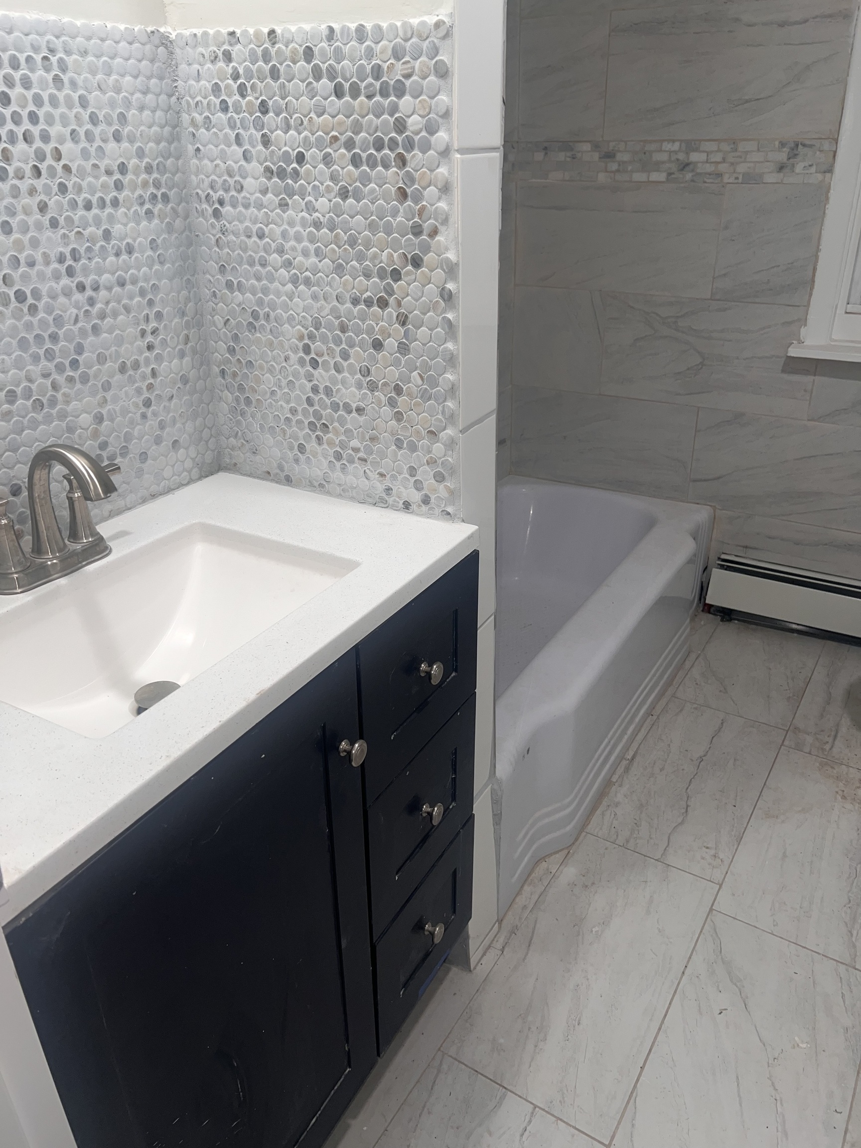 121 Pond Lily Avenue New Haven, CT 06515 - Photo 6 of 22 a bathroom with a sink and a bathtub