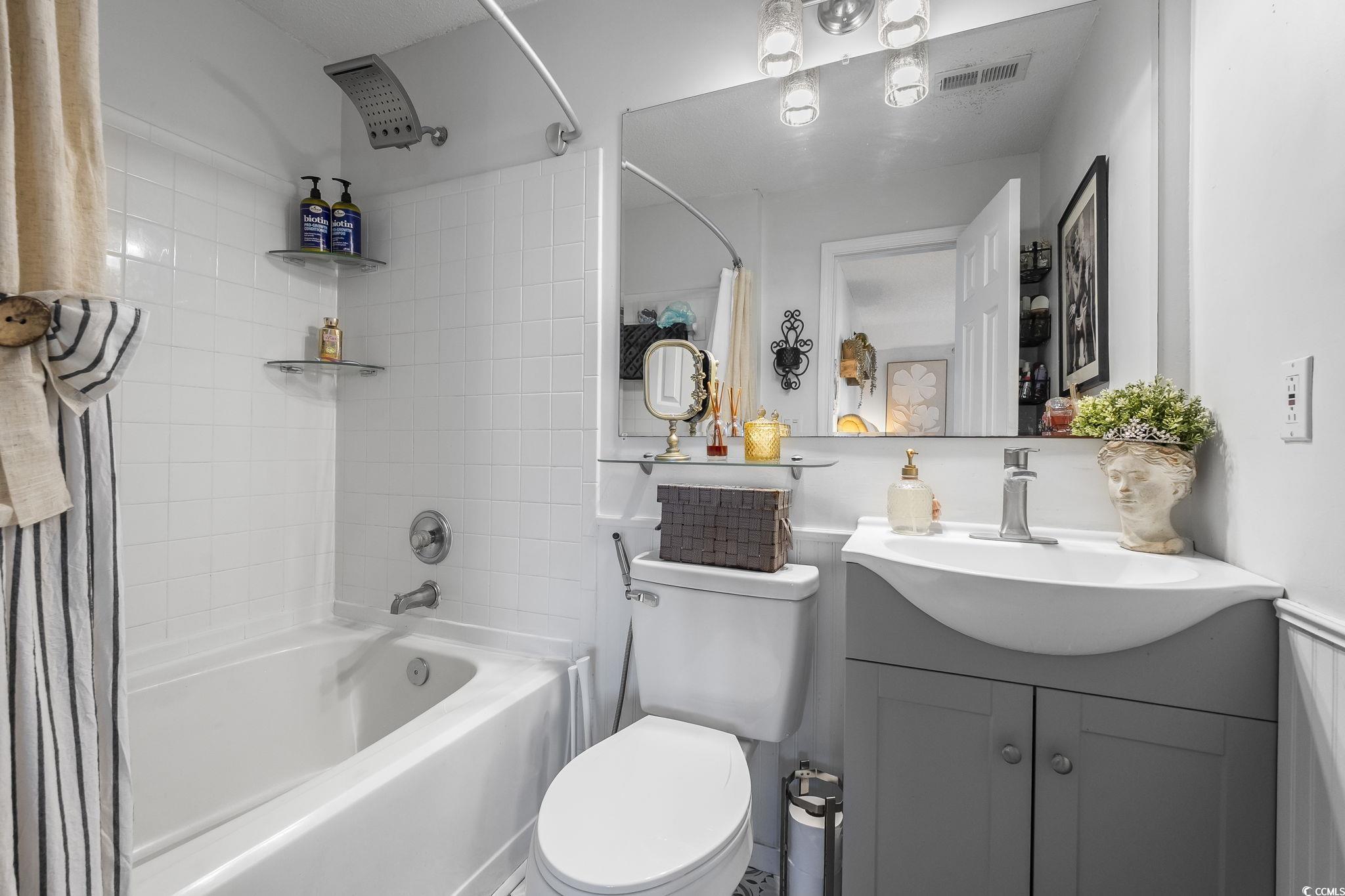 3753 Citation Way, Unit 438 Myrtle Beach, SC 29577 - Photo 19 of 33 Full bath featuring shower / bathtub combination with curtain and vanity