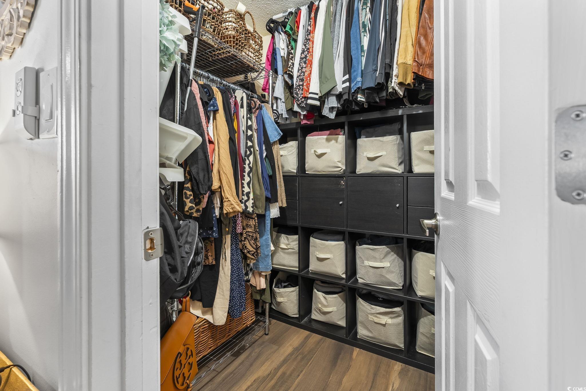 3753 Citation Way, Unit 438 Myrtle Beach, SC 29577 - Photo 20 of 33 Walk in closet featuring dark wood-style floors