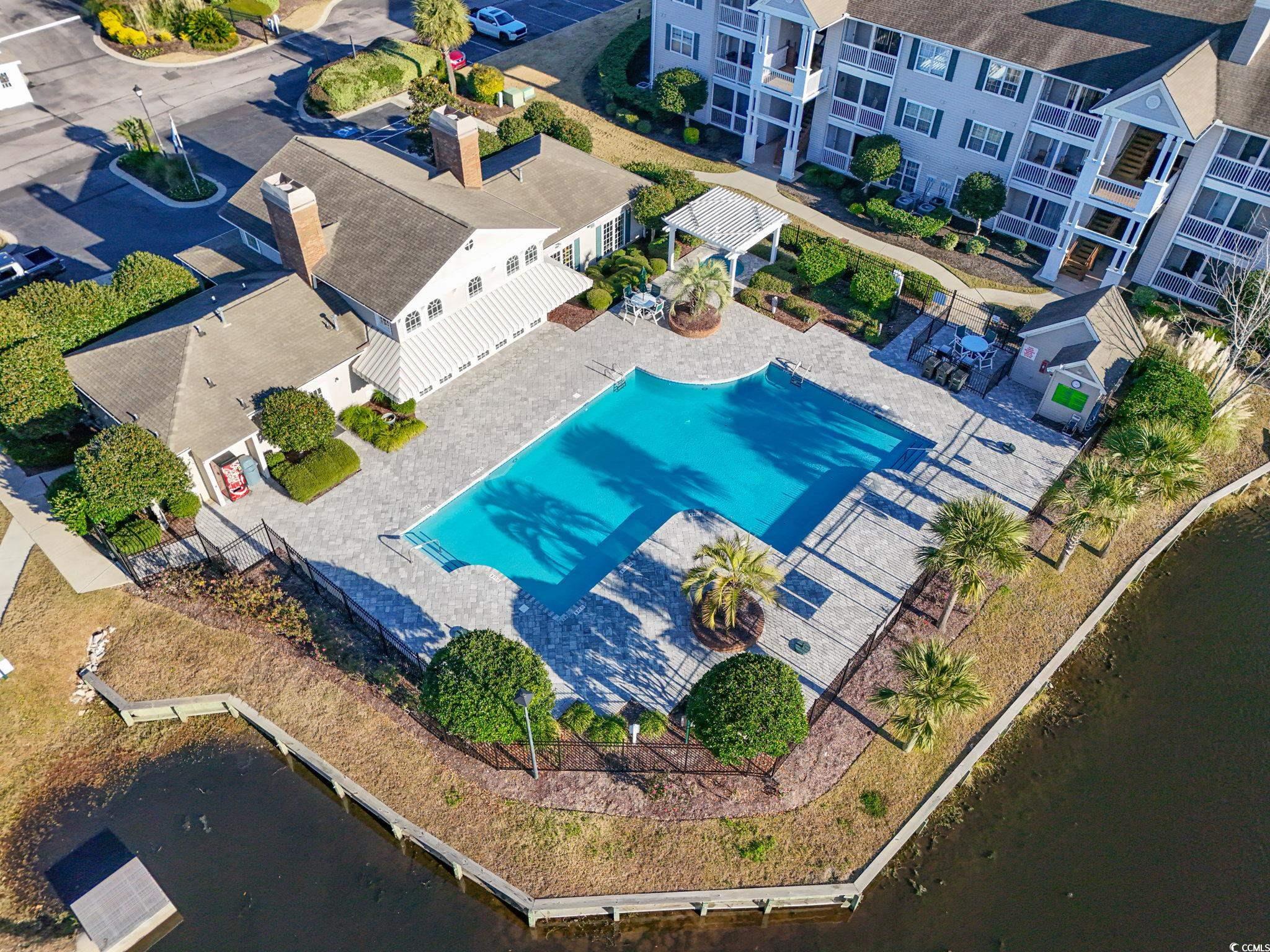 3753 Citation Way, Unit 438 Myrtle Beach, SC 29577 - Photo 28 of 33 Drone / aerial view of a pool