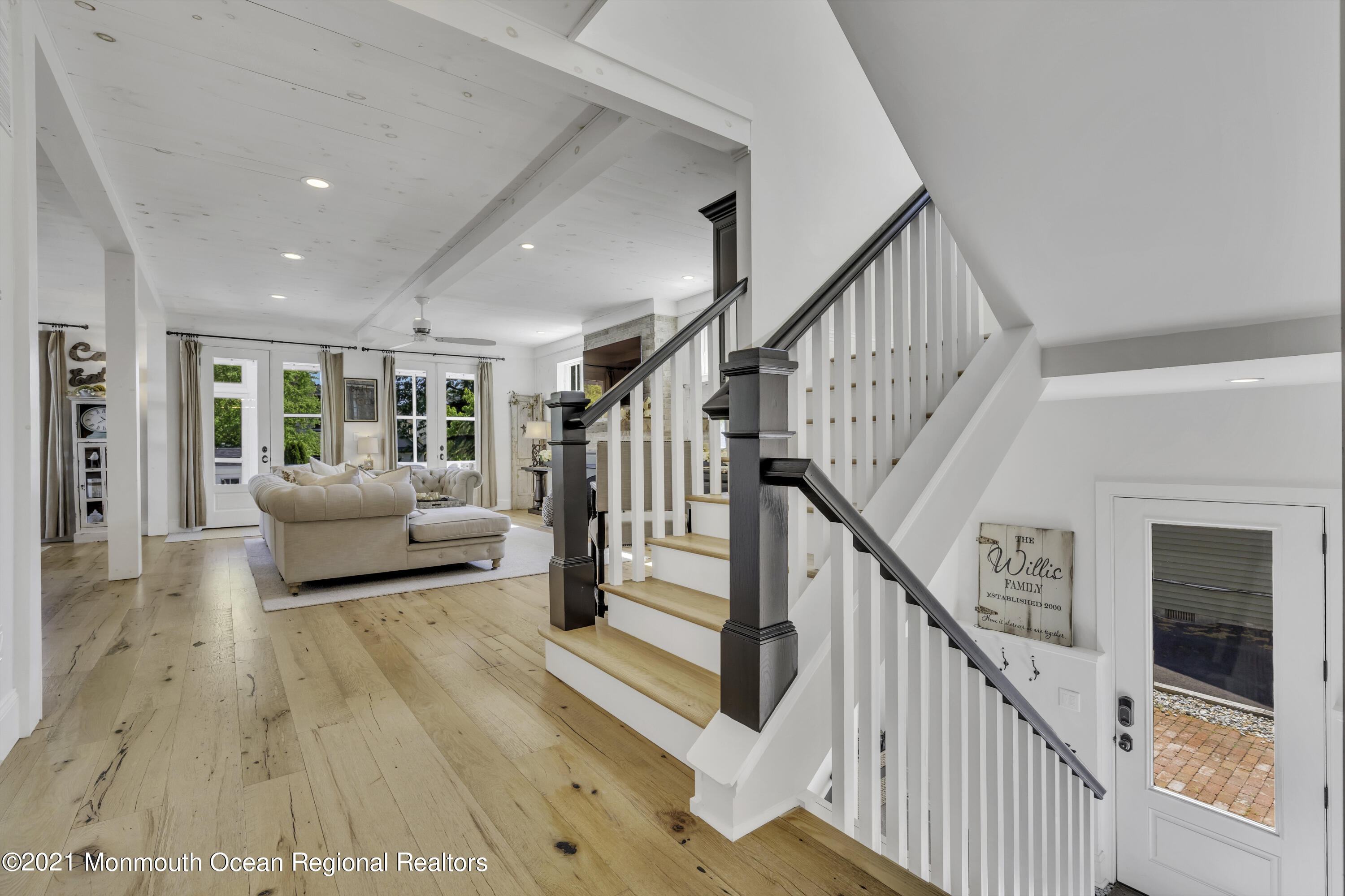 52 Marcellus Avenue Manasquan, NJ 08736 - Photo 12 of 79 a living room with furniture and stairs