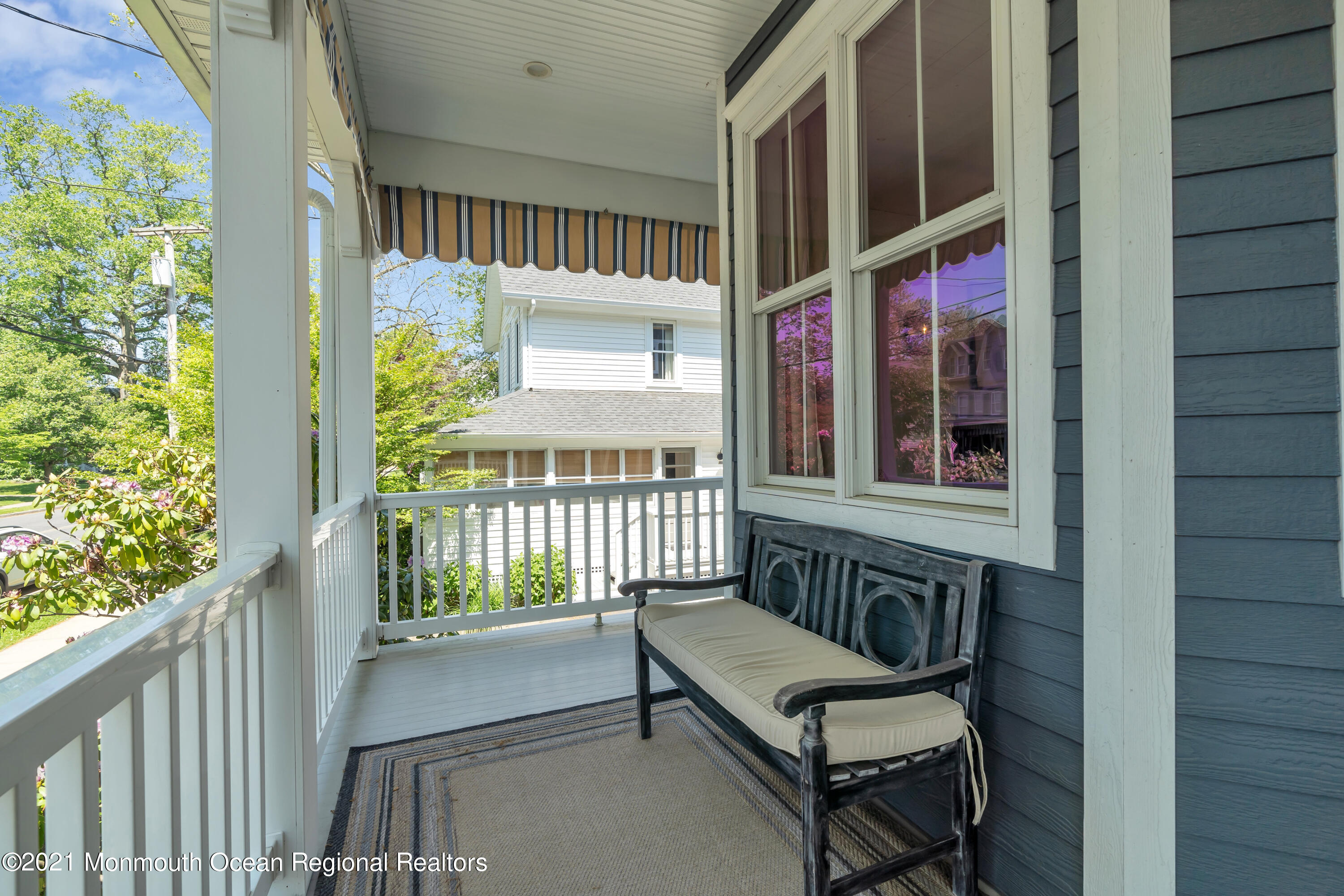 52 Marcellus Avenue Manasquan, NJ 08736 - Photo 4 of 79 a view of a balcony with furniture