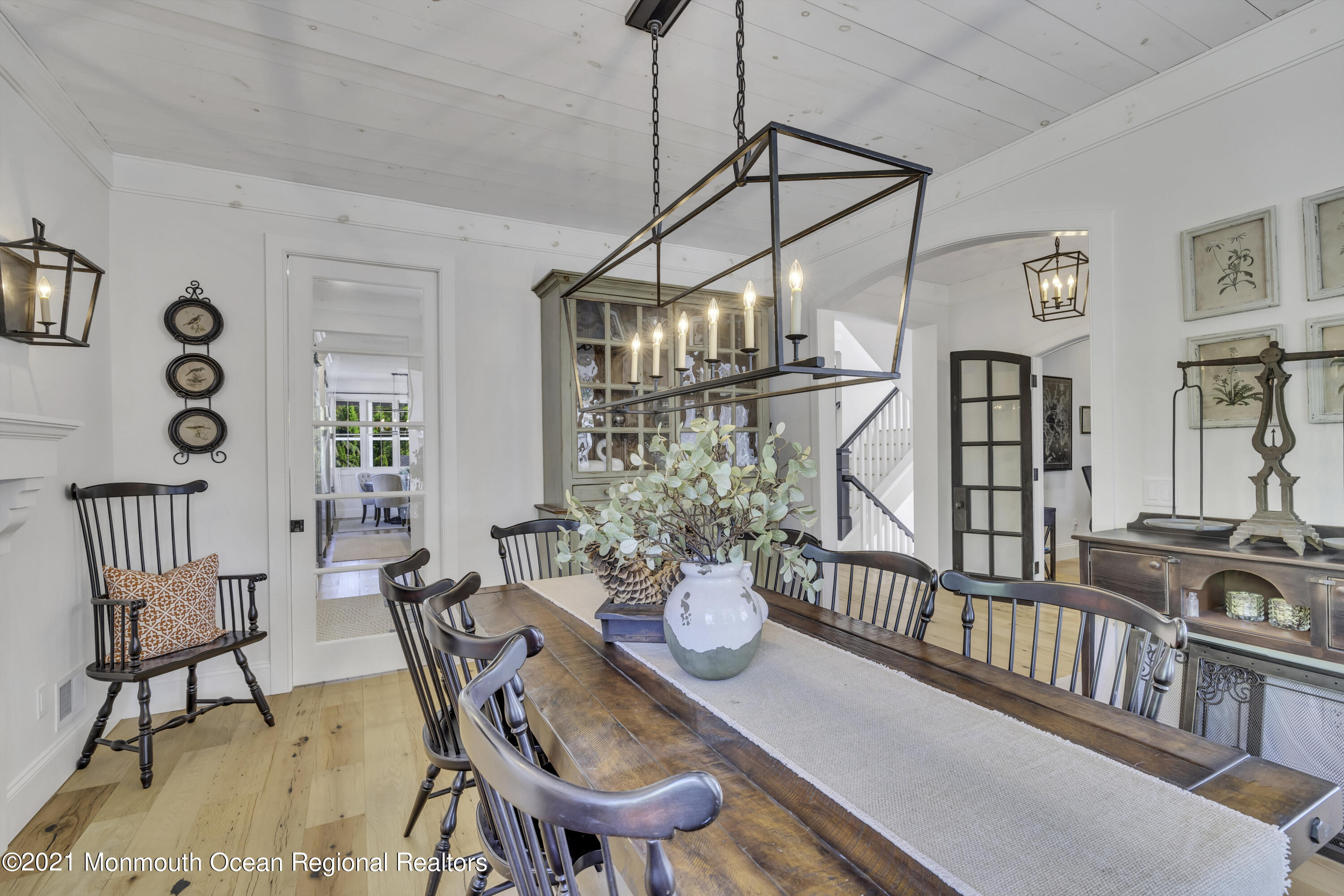 52 Marcellus Avenue Manasquan, NJ 08736 - Photo 32 of 79 a view of a dining room with furniture window and wooden floor