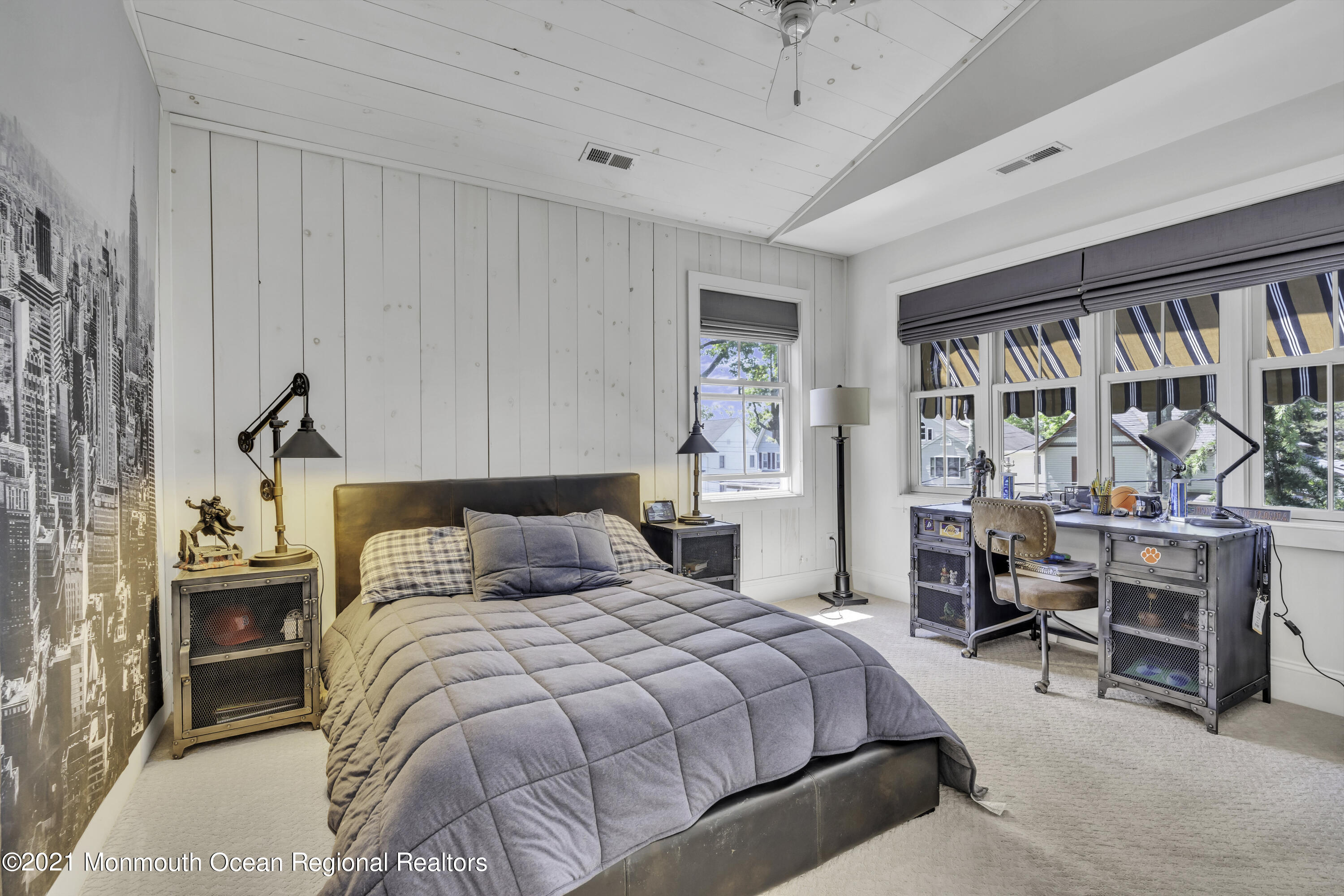 52 Marcellus Avenue Manasquan, NJ 08736 - Photo 43 of 79 a bedroom with a large bed and a large window