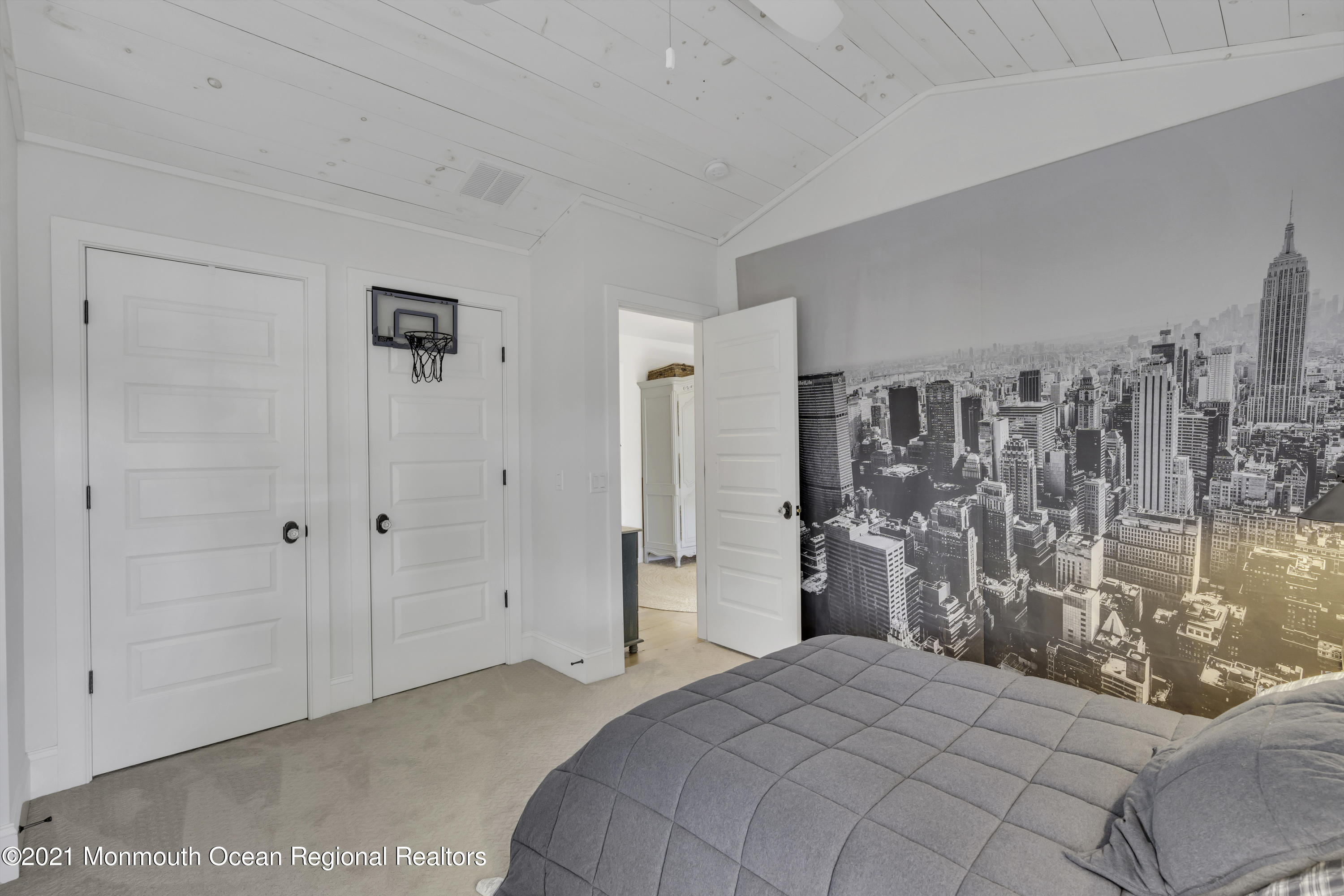 52 Marcellus Avenue Manasquan, NJ 08736 - Photo 45 of 79 a bedroom with a bed and a view of bathroom