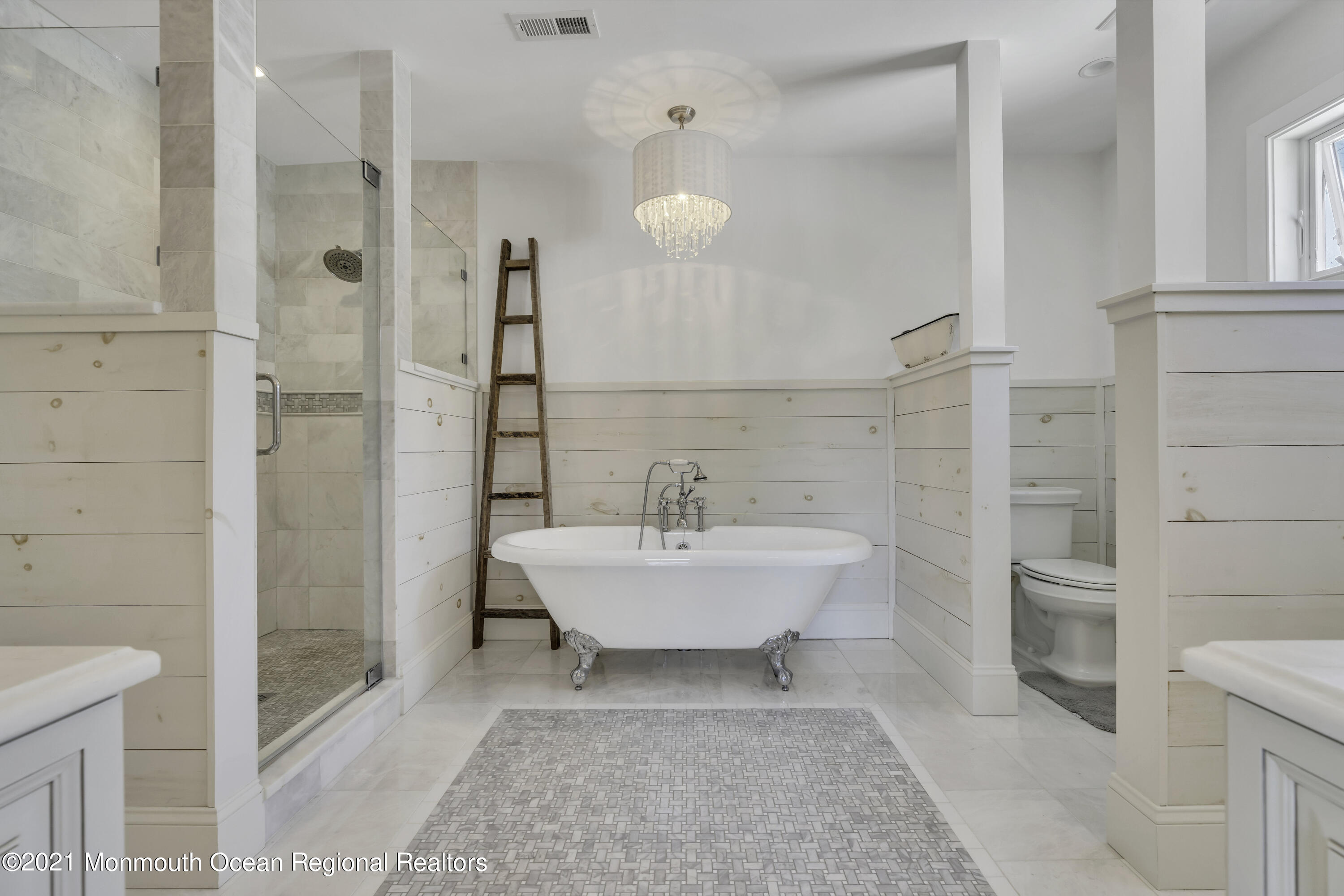 52 Marcellus Avenue Manasquan, NJ 08736 - Photo 59 of 79 a bathroom with a sink a toilet and shower