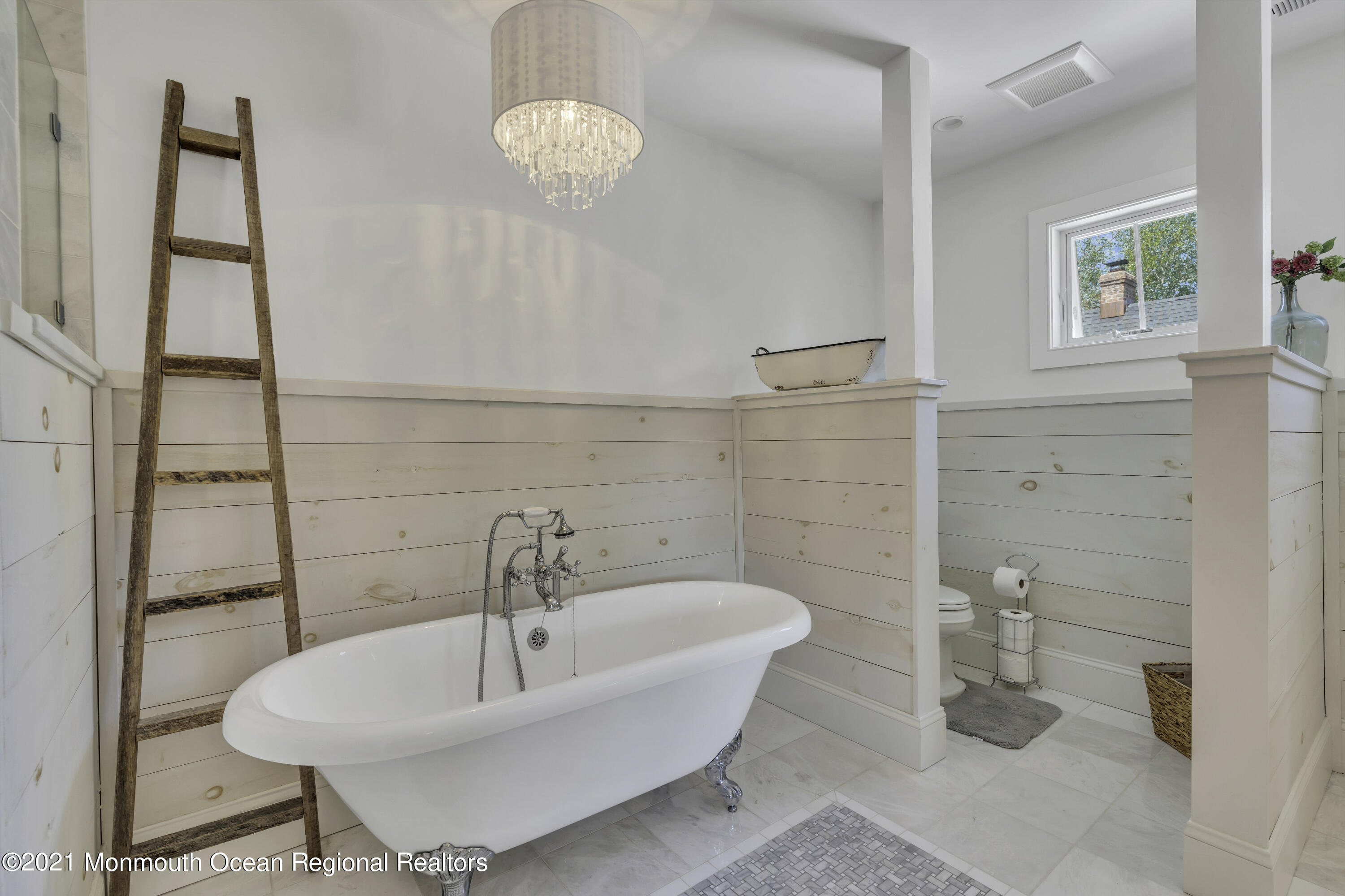 52 Marcellus Avenue Manasquan, NJ 08736 - Photo 63 of 79 a bathroom with a sink a toilet and shower