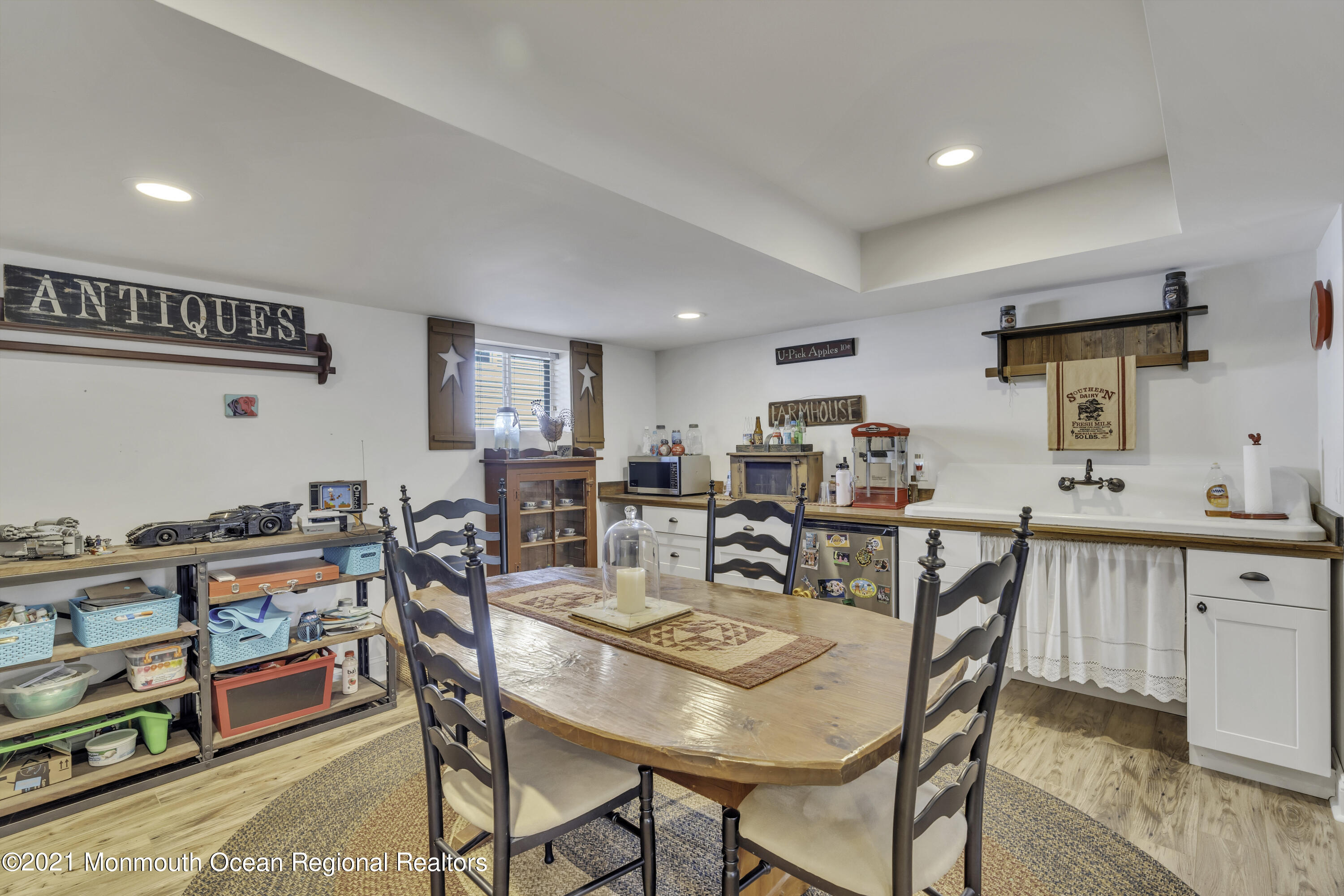 52 Marcellus Avenue Manasquan, NJ 08736 - Photo 66 of 79 a view of a dining area with furniture and wooden floor