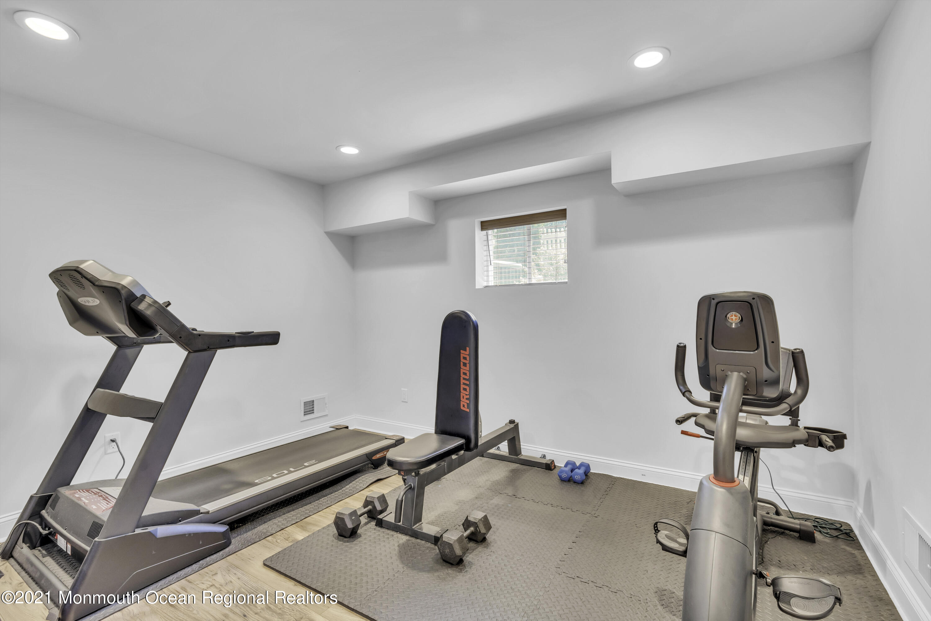 52 Marcellus Avenue Manasquan, NJ 08736 - Photo 71 of 79 a room with gym equipment