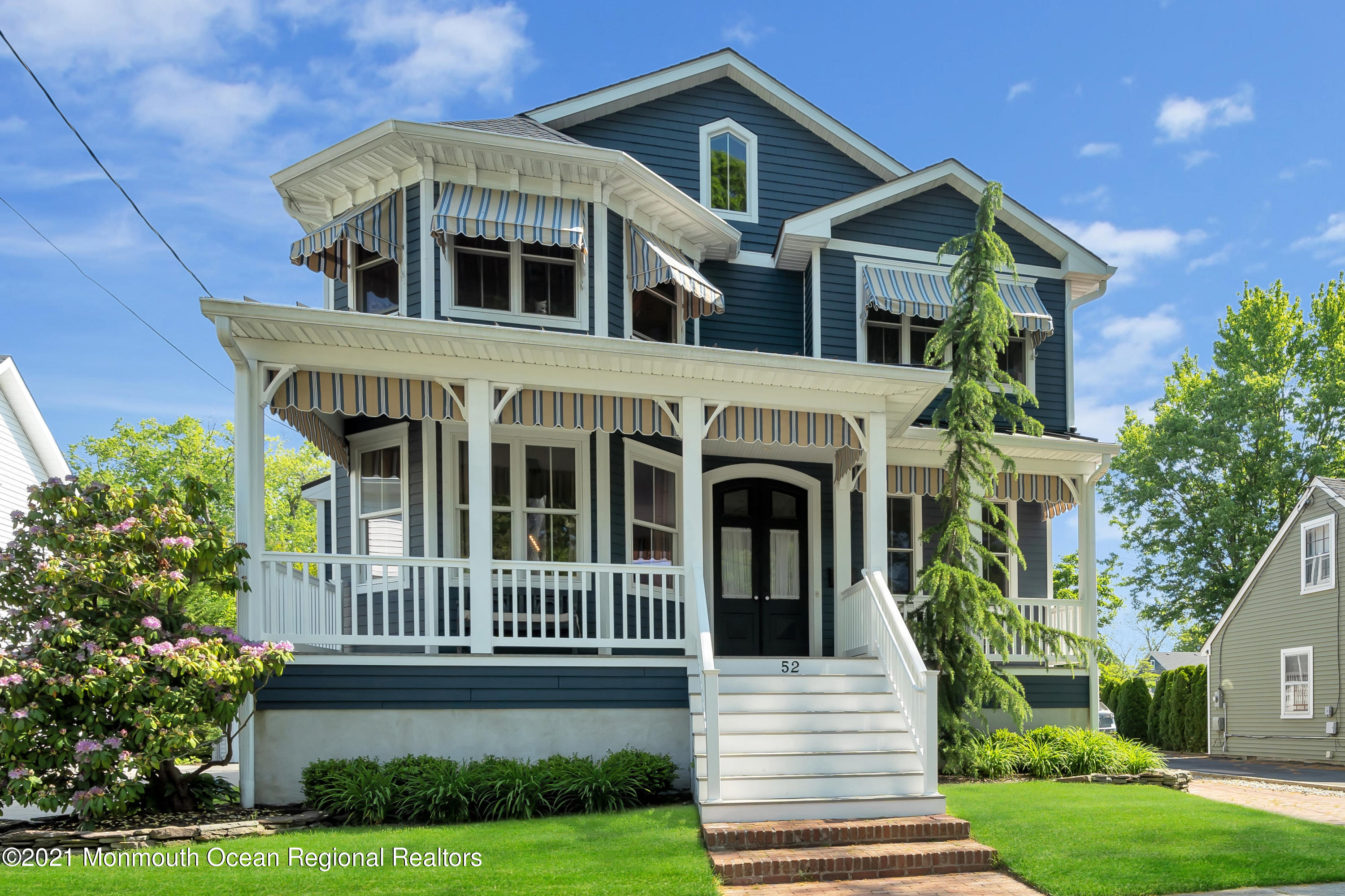 52 Marcellus Avenue Manasquan, NJ 08736 - Photo 75 of 79 a front view of a house with garden