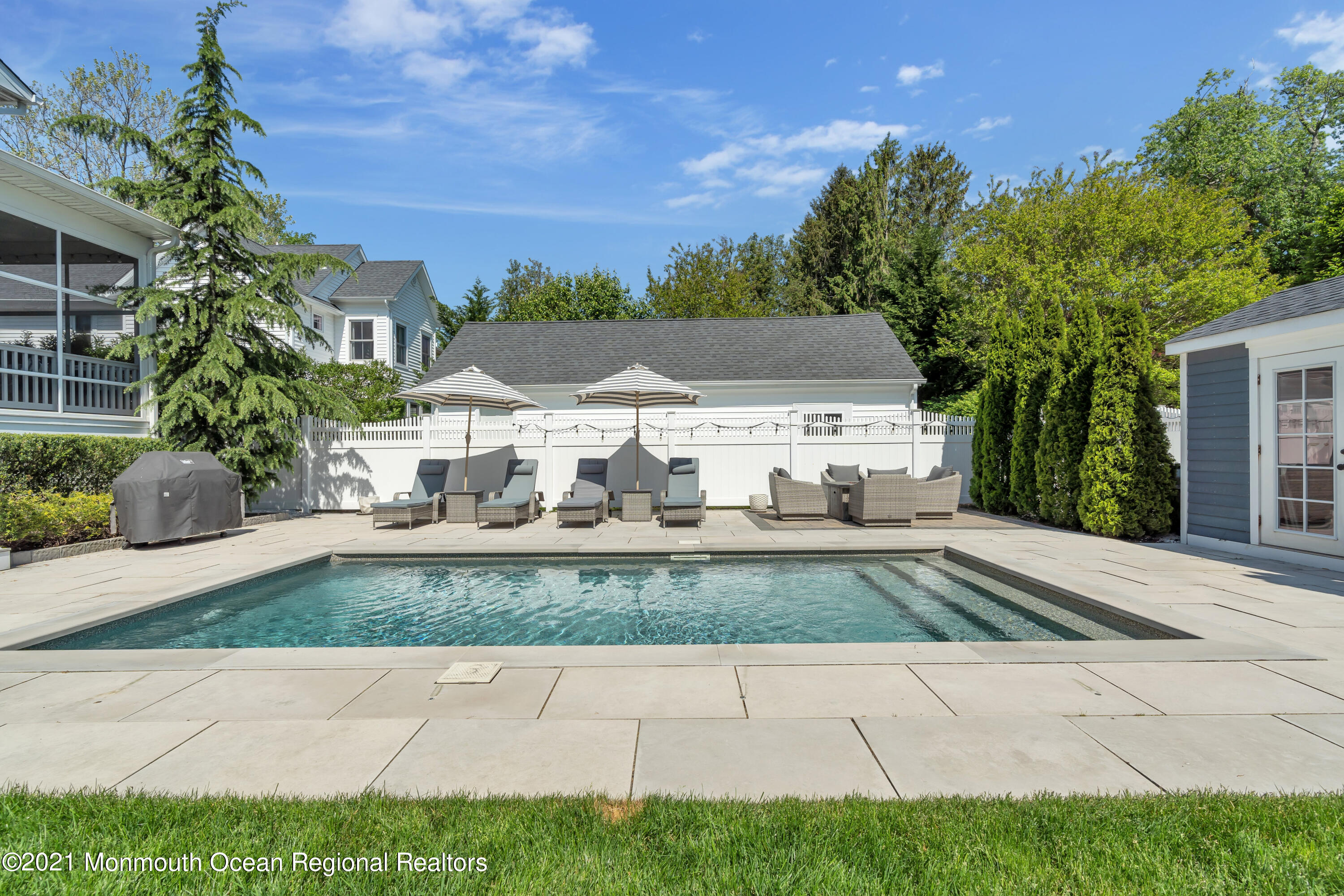 52 Marcellus Avenue Manasquan, NJ 08736 - Photo 76 of 79 a front view of a house with yard