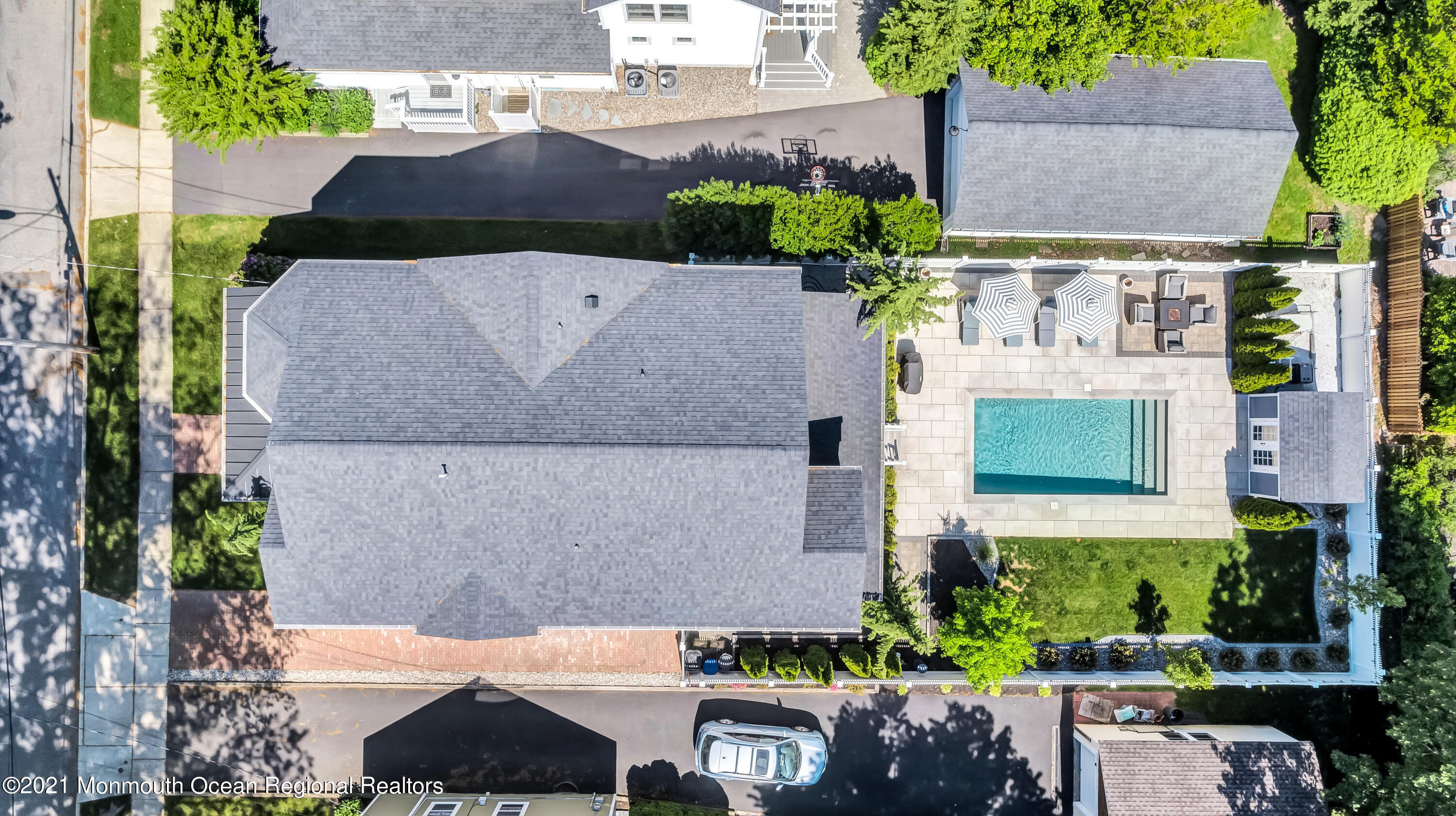 52 Marcellus Avenue Manasquan, NJ 08736 - Photo 78 of 79 an aerial view of multiple houses with a yard