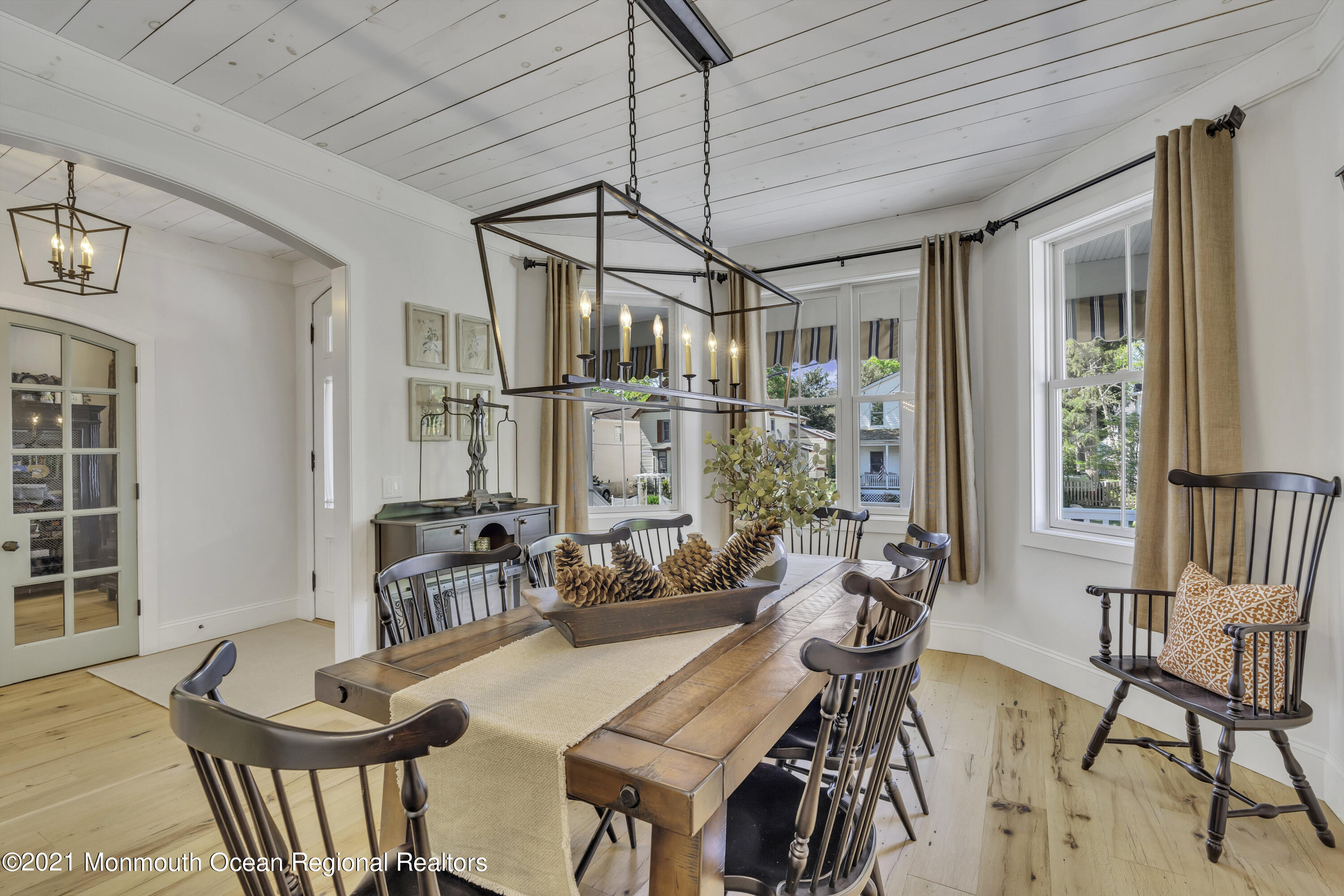 52 Marcellus Avenue Manasquan, NJ 08736 - Photo 10 of 79 a view of a dining room with furniture window and outside view